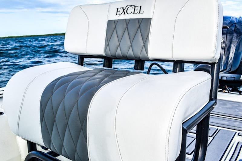 2026 Excel 230 Bay Pro Elite boat seat with quilted design on open water.