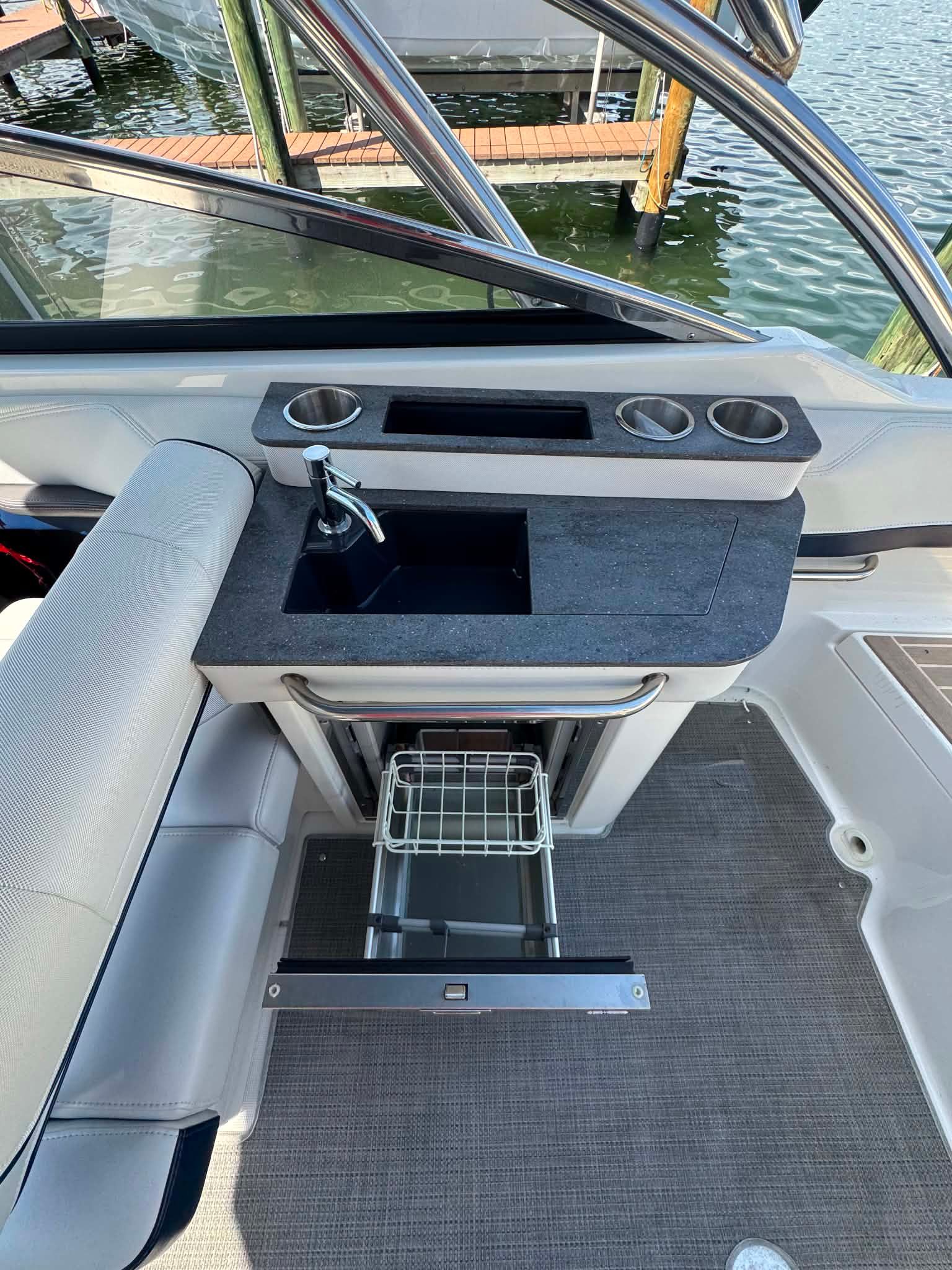 Interior of 2018 Formula 270 Bowrider featuring sink and storage.