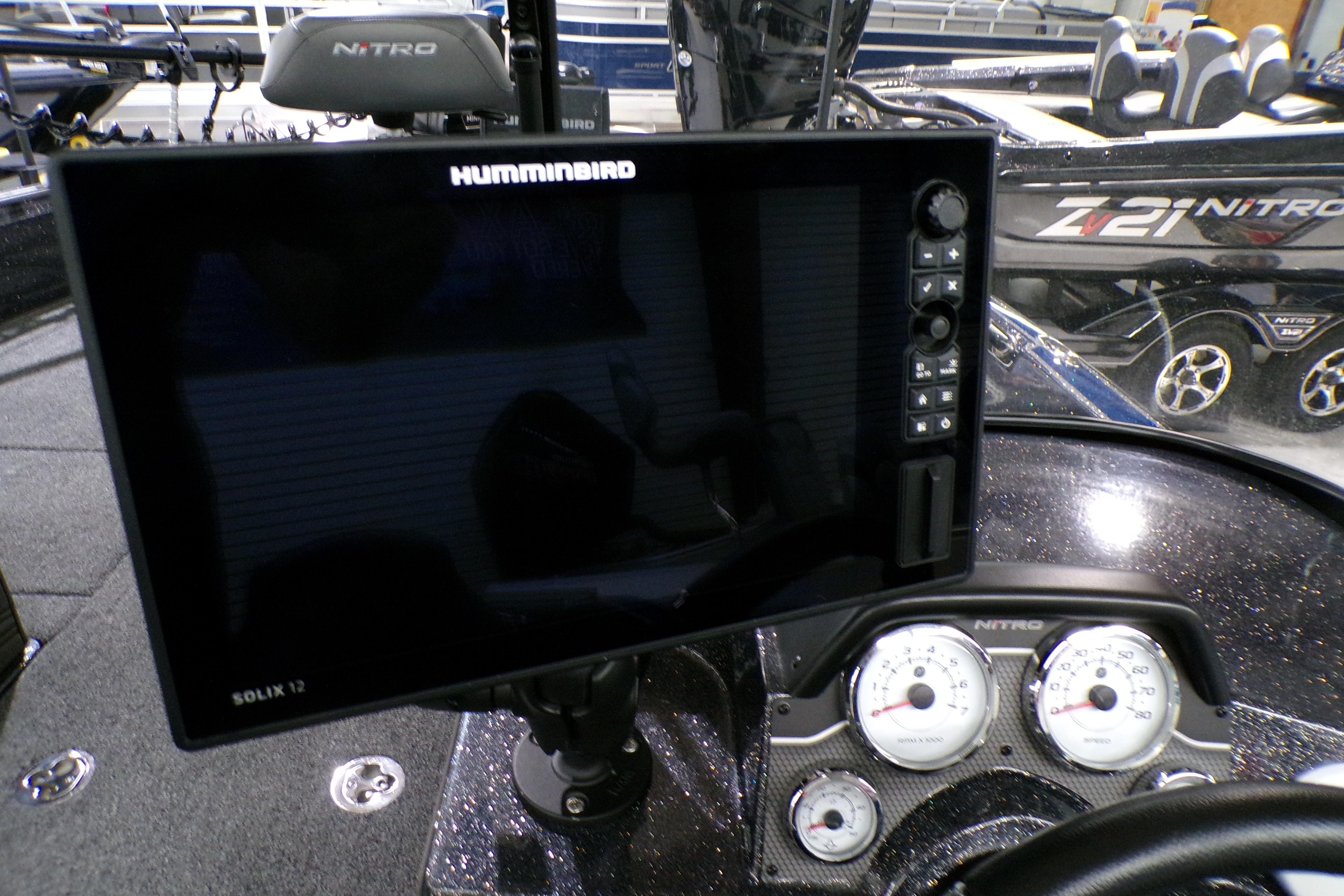 2024 Nitro ZV21 boat dashboard with Humminbird Solix 12 display and gauges.