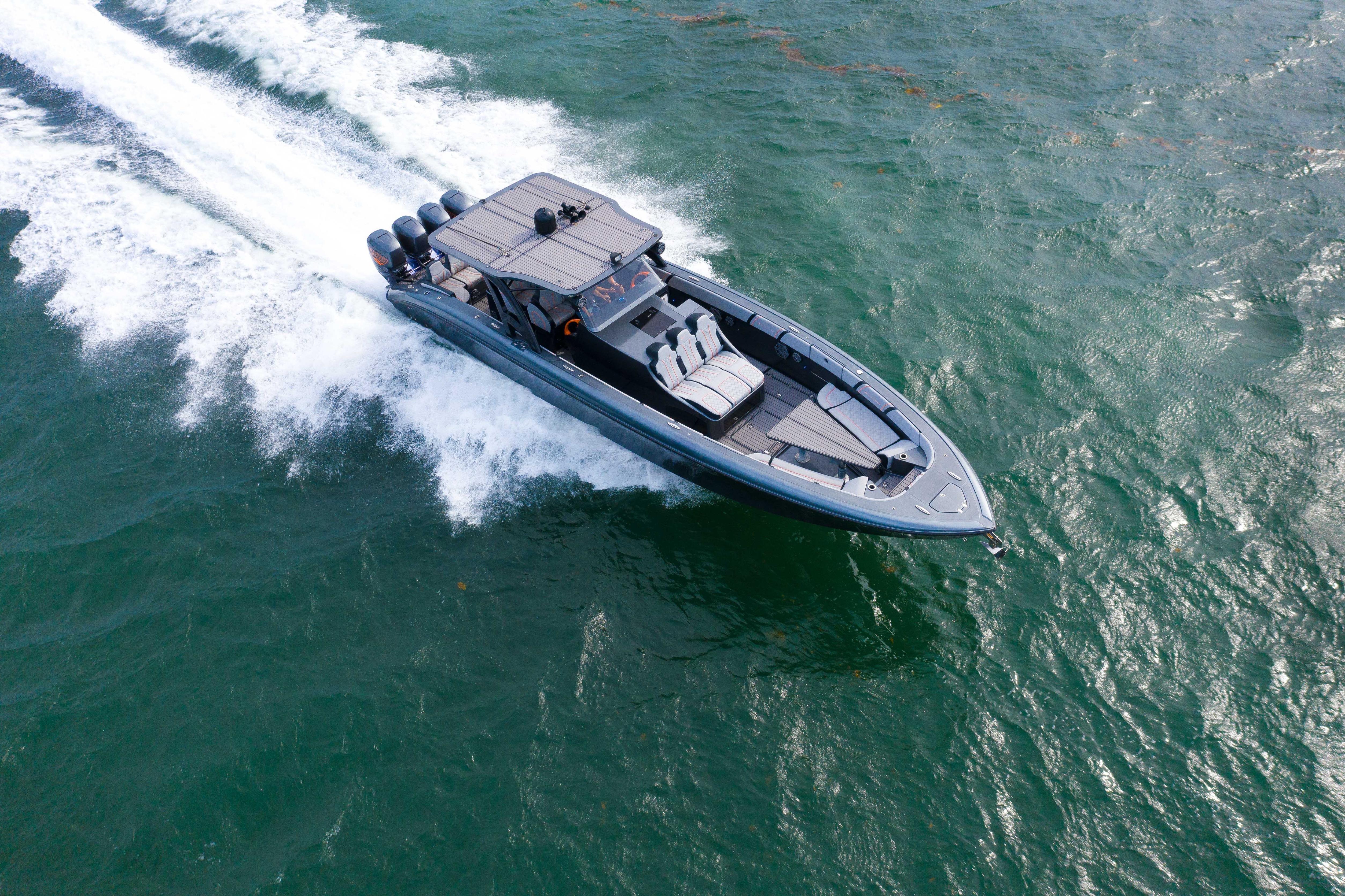 2019 Midnight Express 43 Open boat cruising on open water, aerial view.