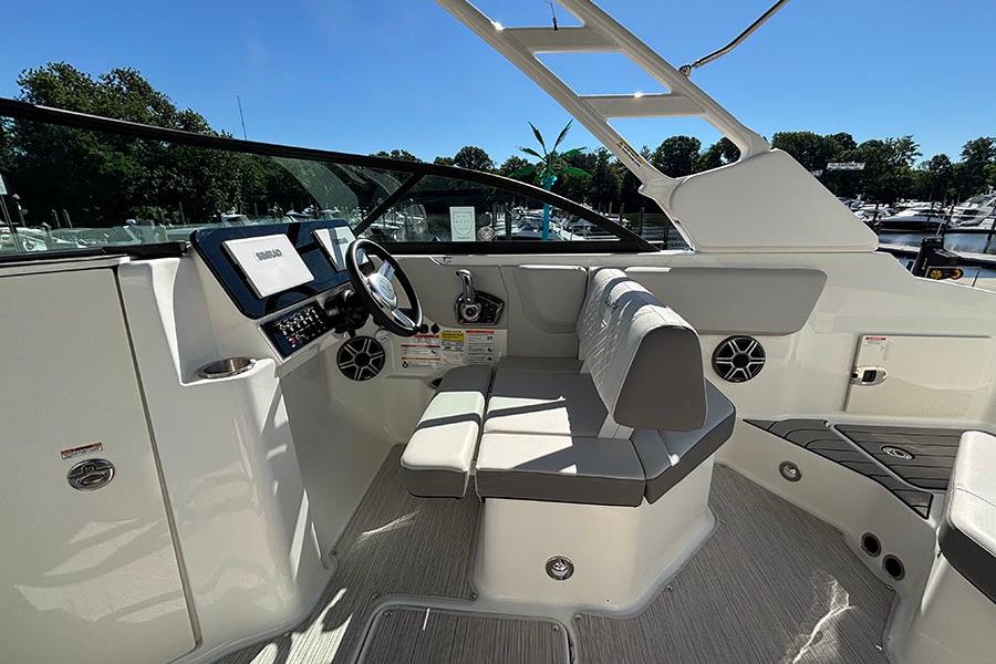 2027 Sea Ray SDX 230 Outboard boat interior with modern helm and seating.