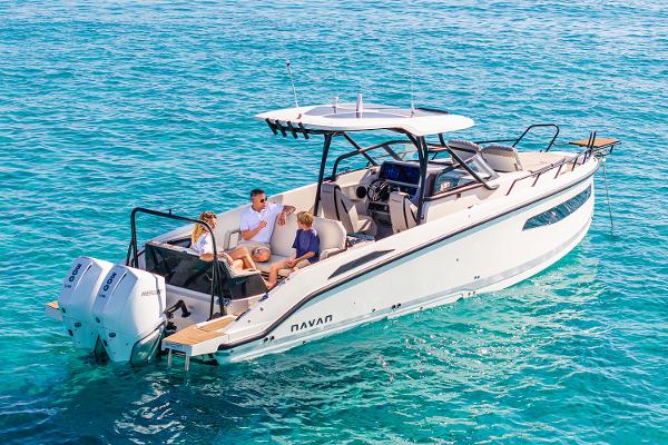Manufacturer Provided Image: 2026 Navan S30 boat on clear blue water with passengers enjoying the ride.