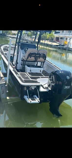 2020 Sportsman Masters 247 Bay Boat in water, side view.