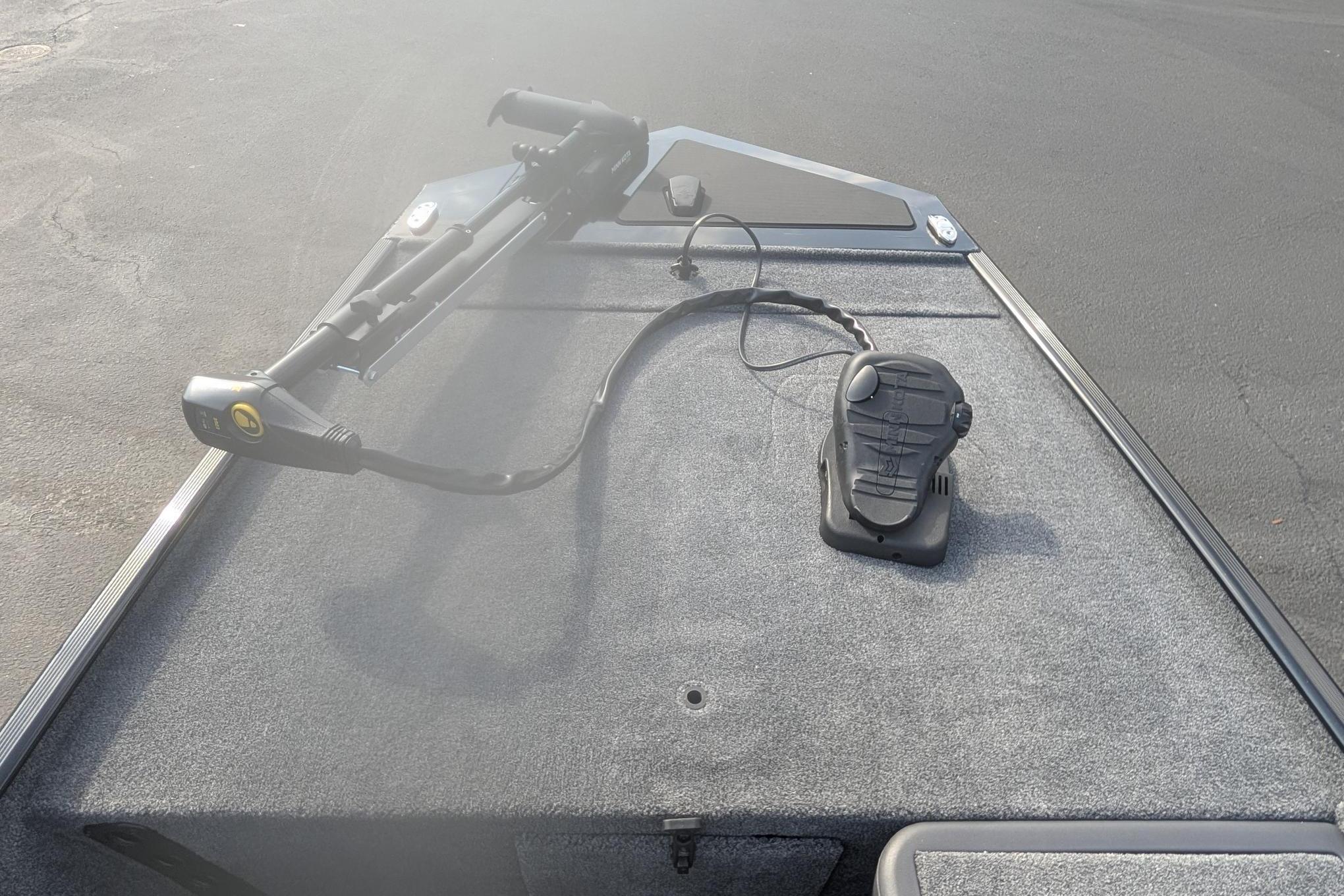 2026 Tracker Bass Tracker Classic XL boat deck with trolling motor and foot pedal.