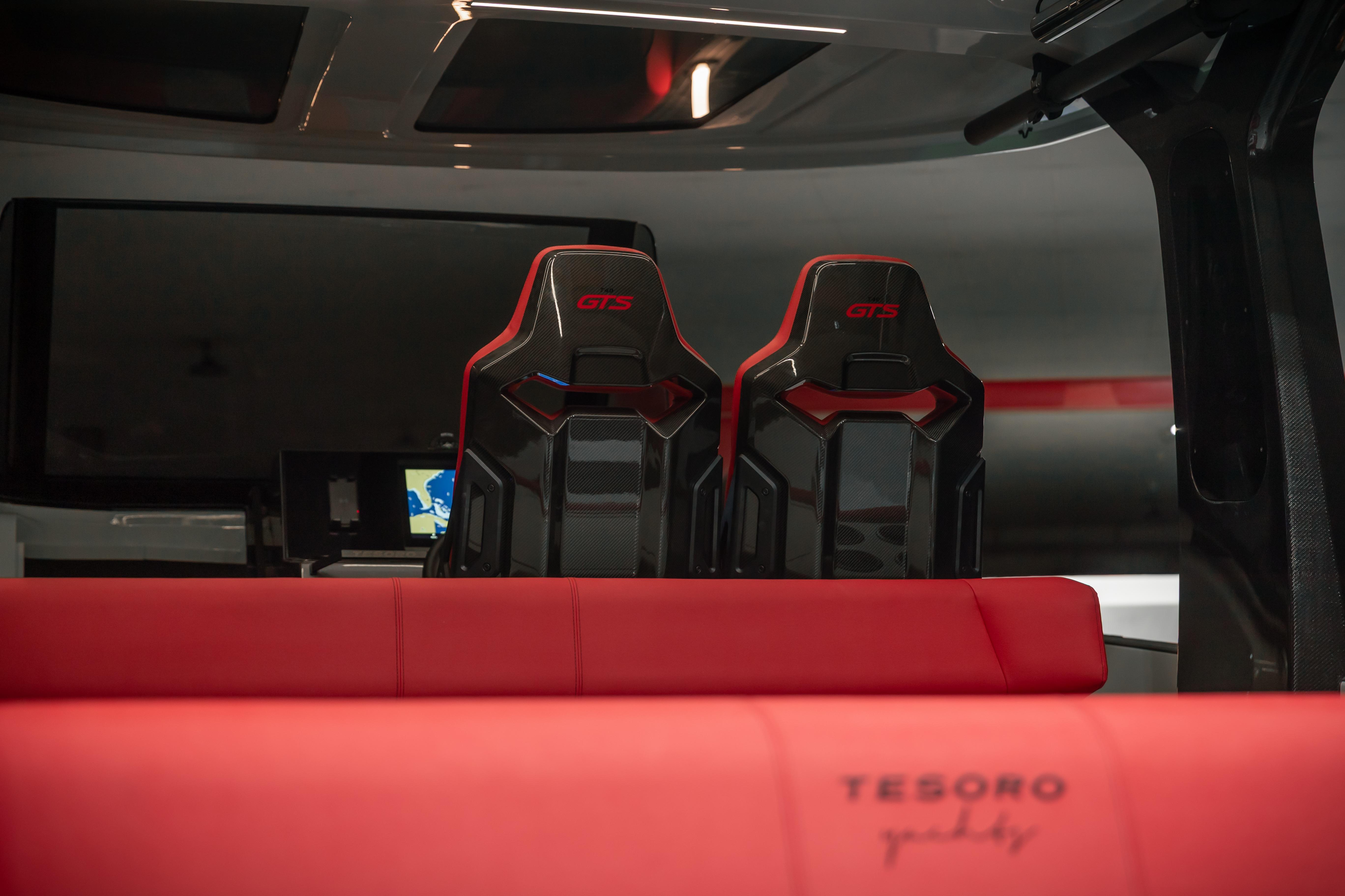 Interior of Tesoro 40 GTS 2026 with red seats.
