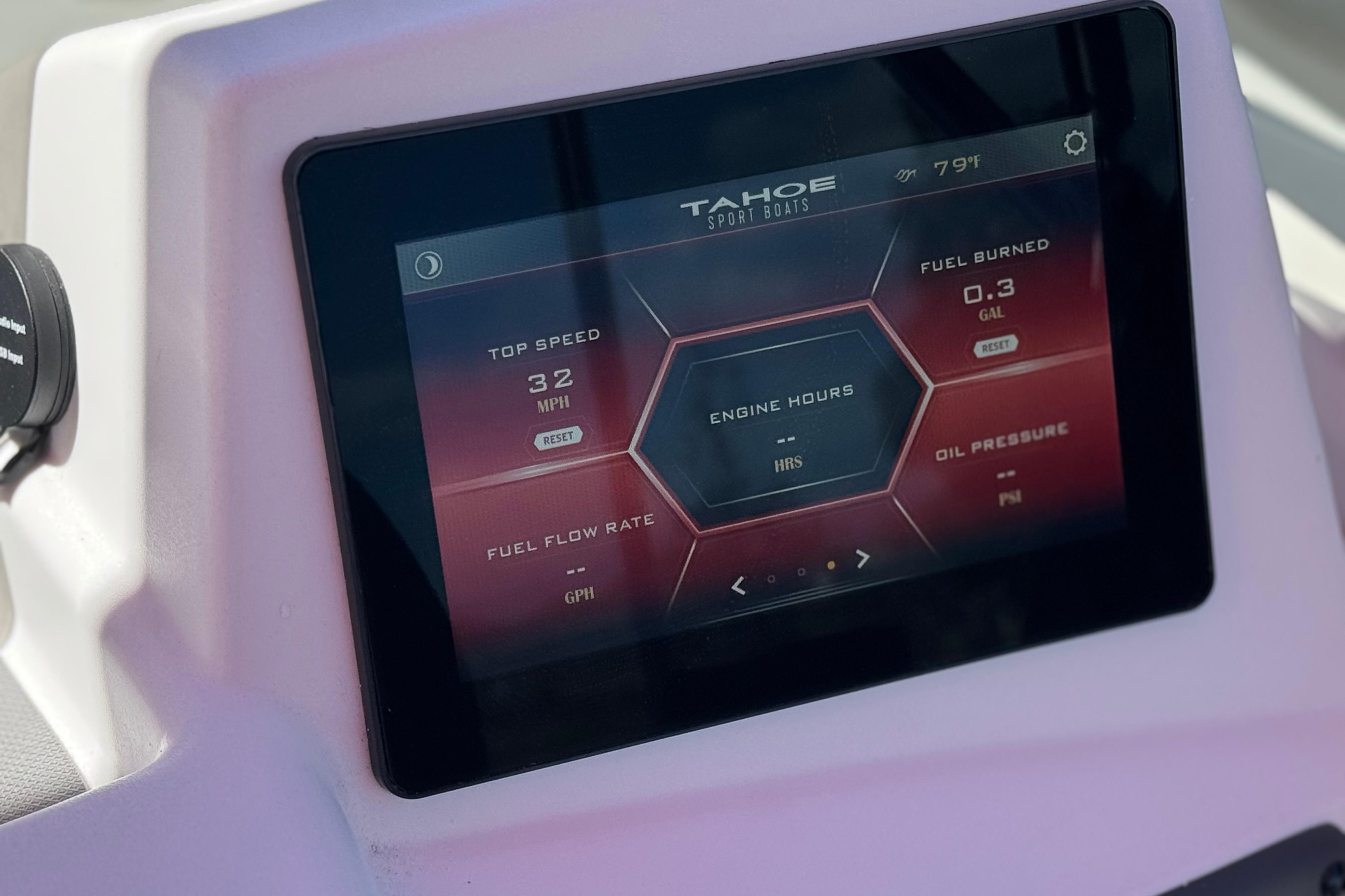2024 Tahoe T16 dashboard display showing speed, fuel, and engine metrics.