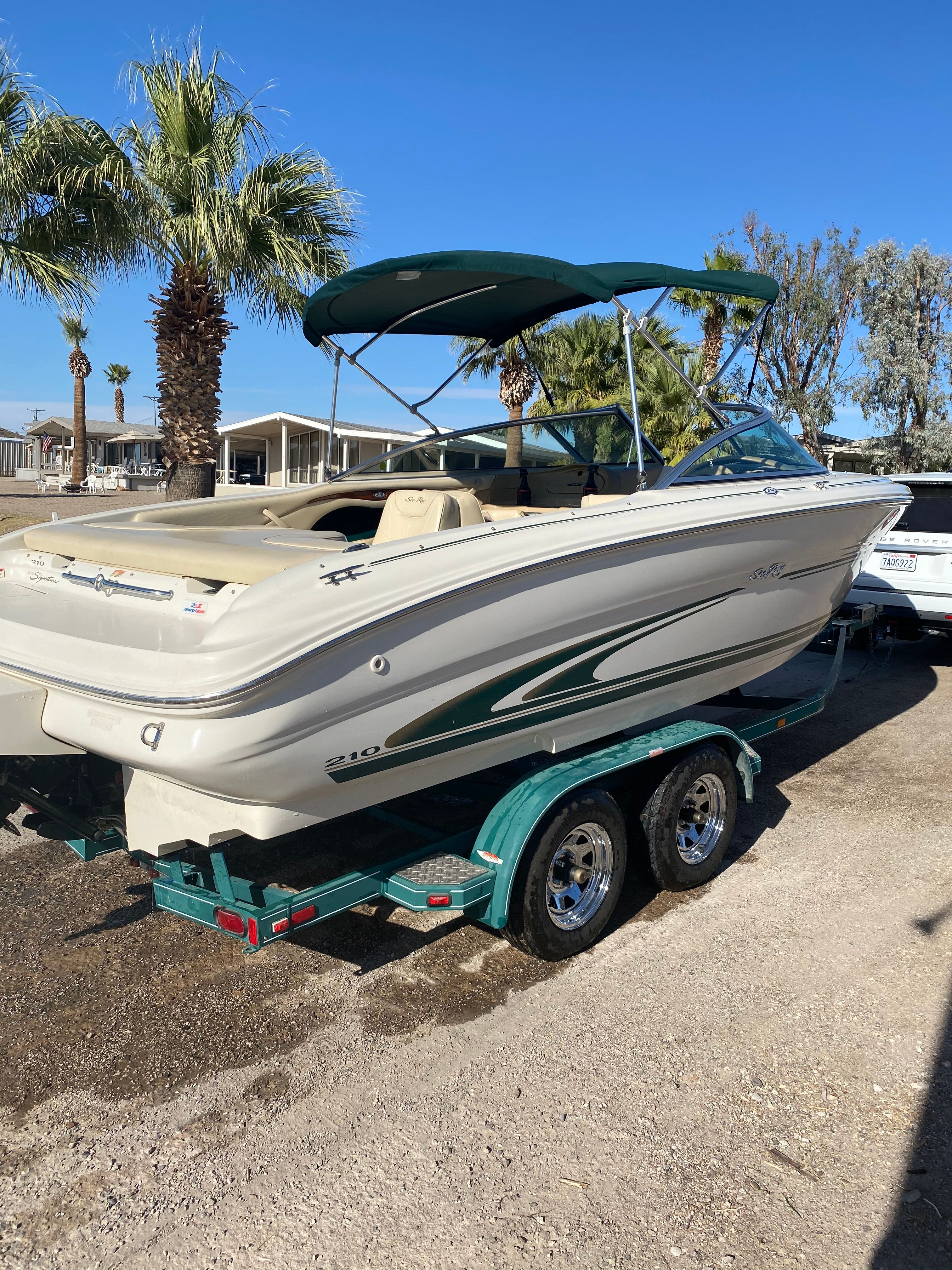 2000 Sea Ray Signature Series boat on trailer, sunny day.