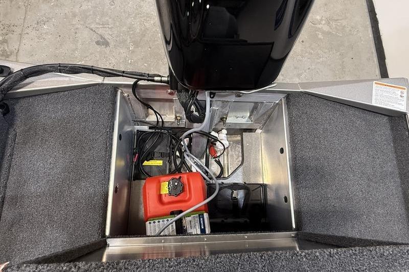 2026 Lowe Skorpion 16 boat engine compartment with wiring and fuel tank.