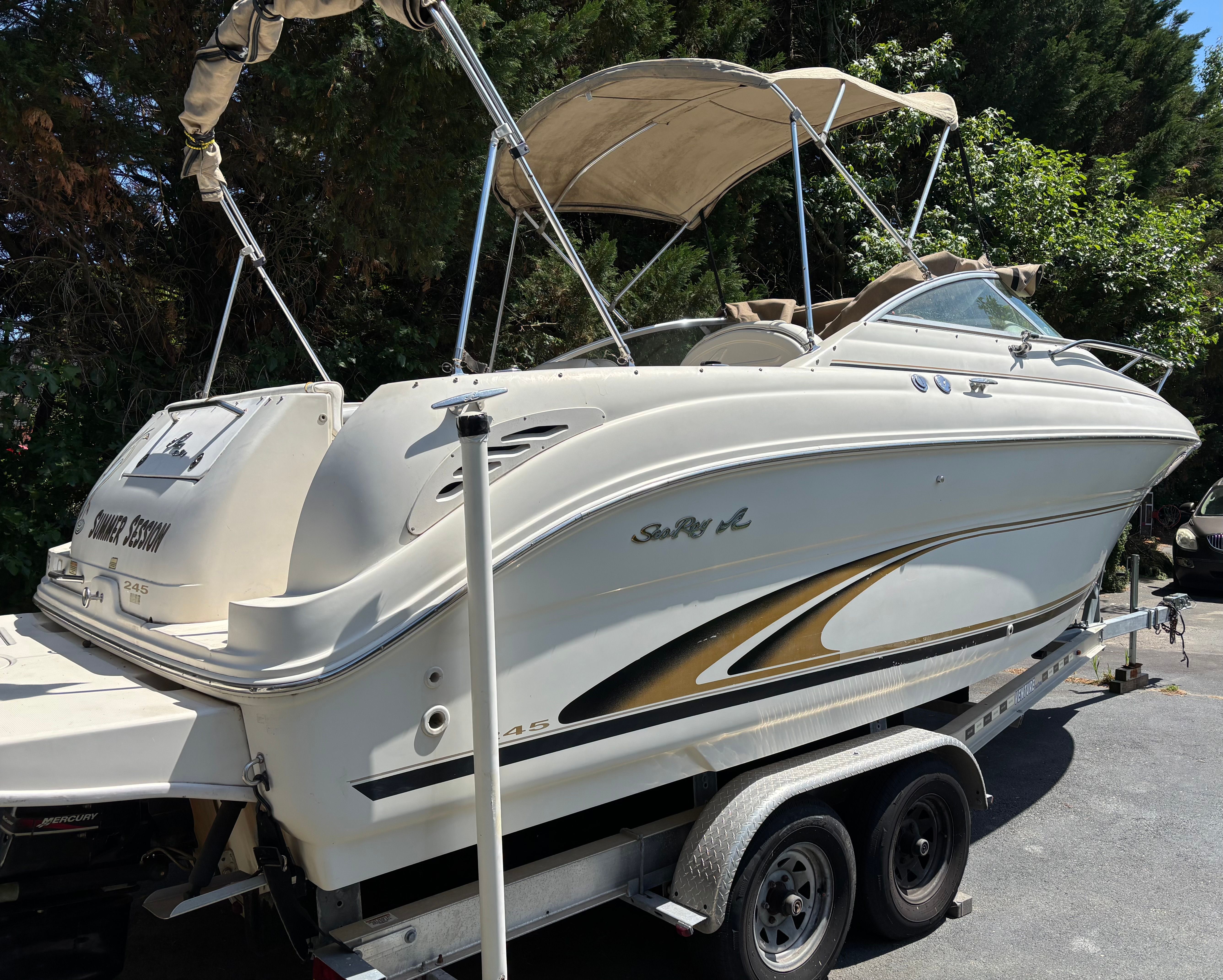 2001 Sea Ray 245 Weekender on trailer, side view.