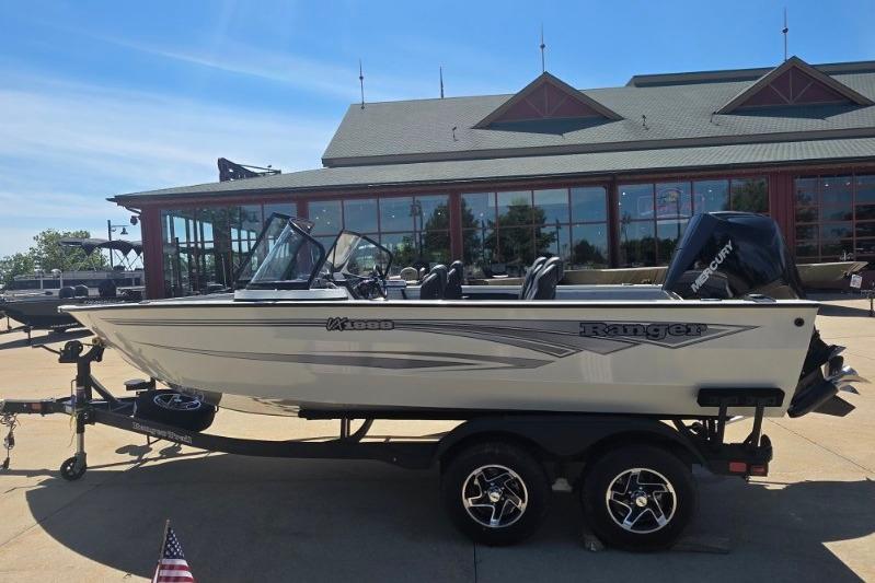 2026 Ranger VX1888 WT boat on trailer, parked outside a building.