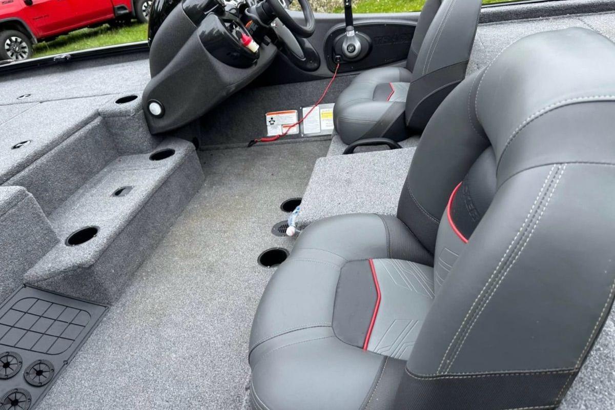 2022 Bass Tracker 195TXW boat interior with gray seating and steering console.