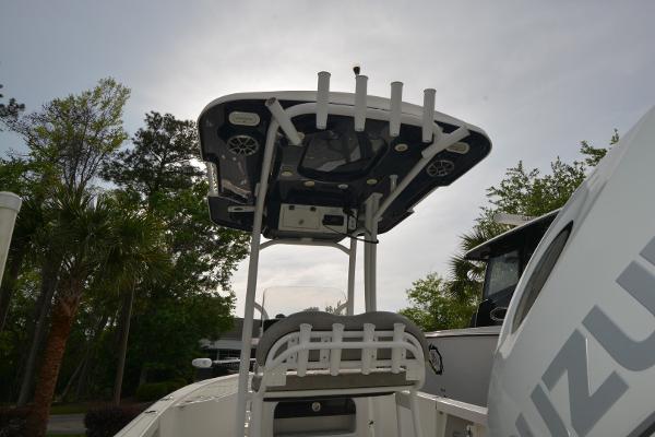 2021 Sea Pro 228 Bay boat with T-top and Suzuki engine, viewed from the rear.