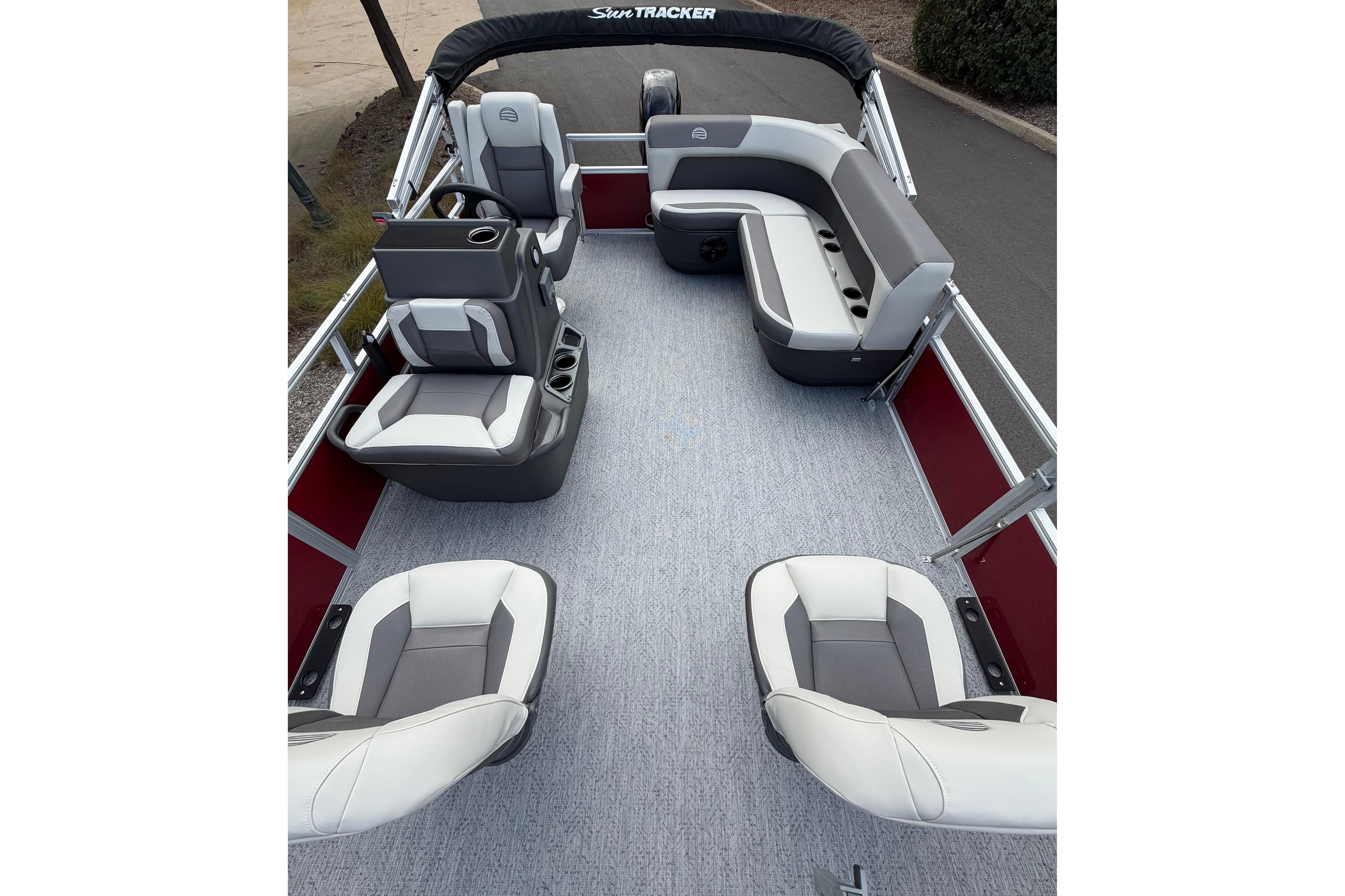 2026 Sun Tracker Bass Buggy 16 XL Select pontoon boat interior with seating and helm.