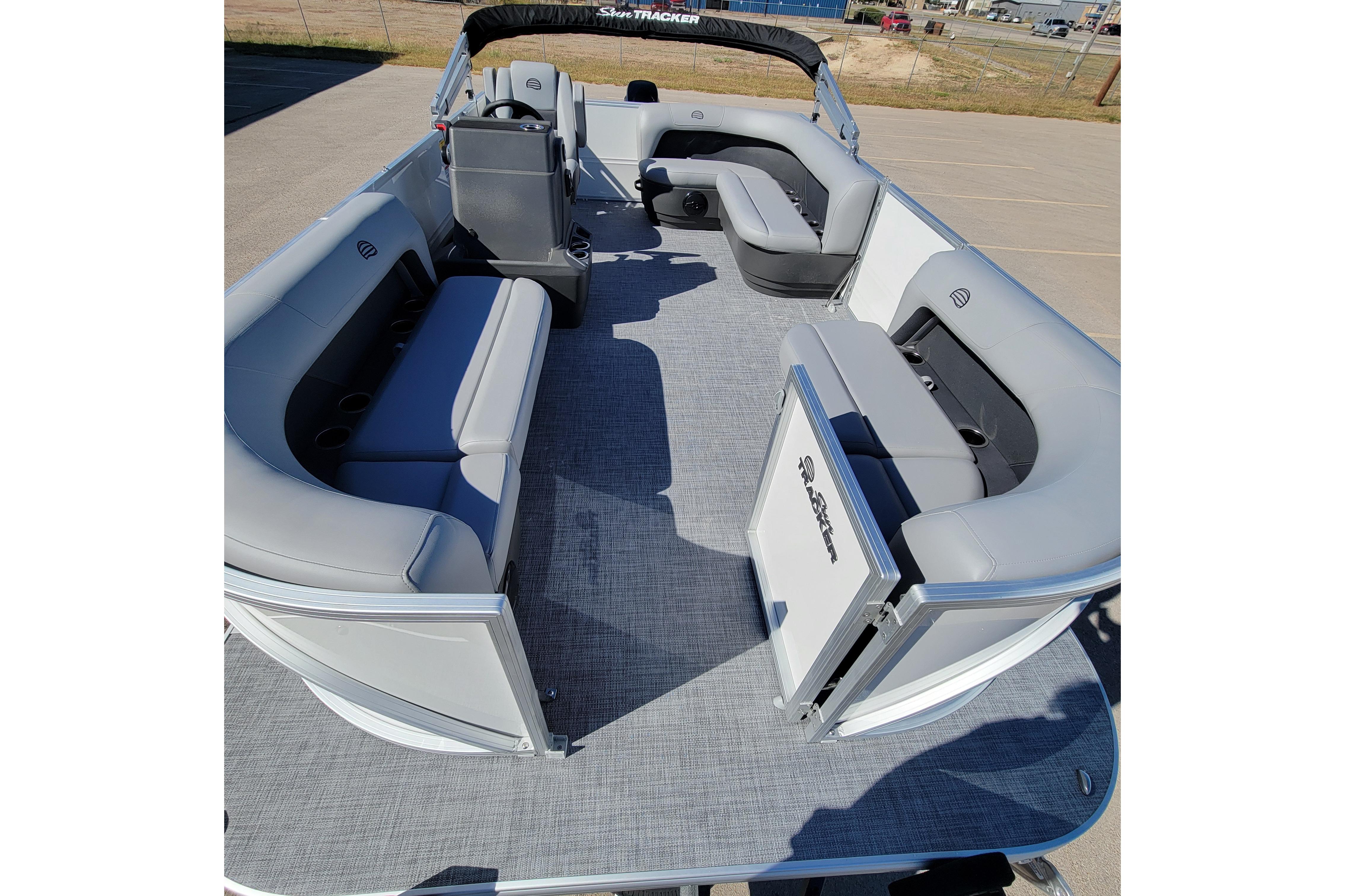 2026 Sun Tracker Party Barge 16 DLX pontoon boat with spacious seating and modern design.
