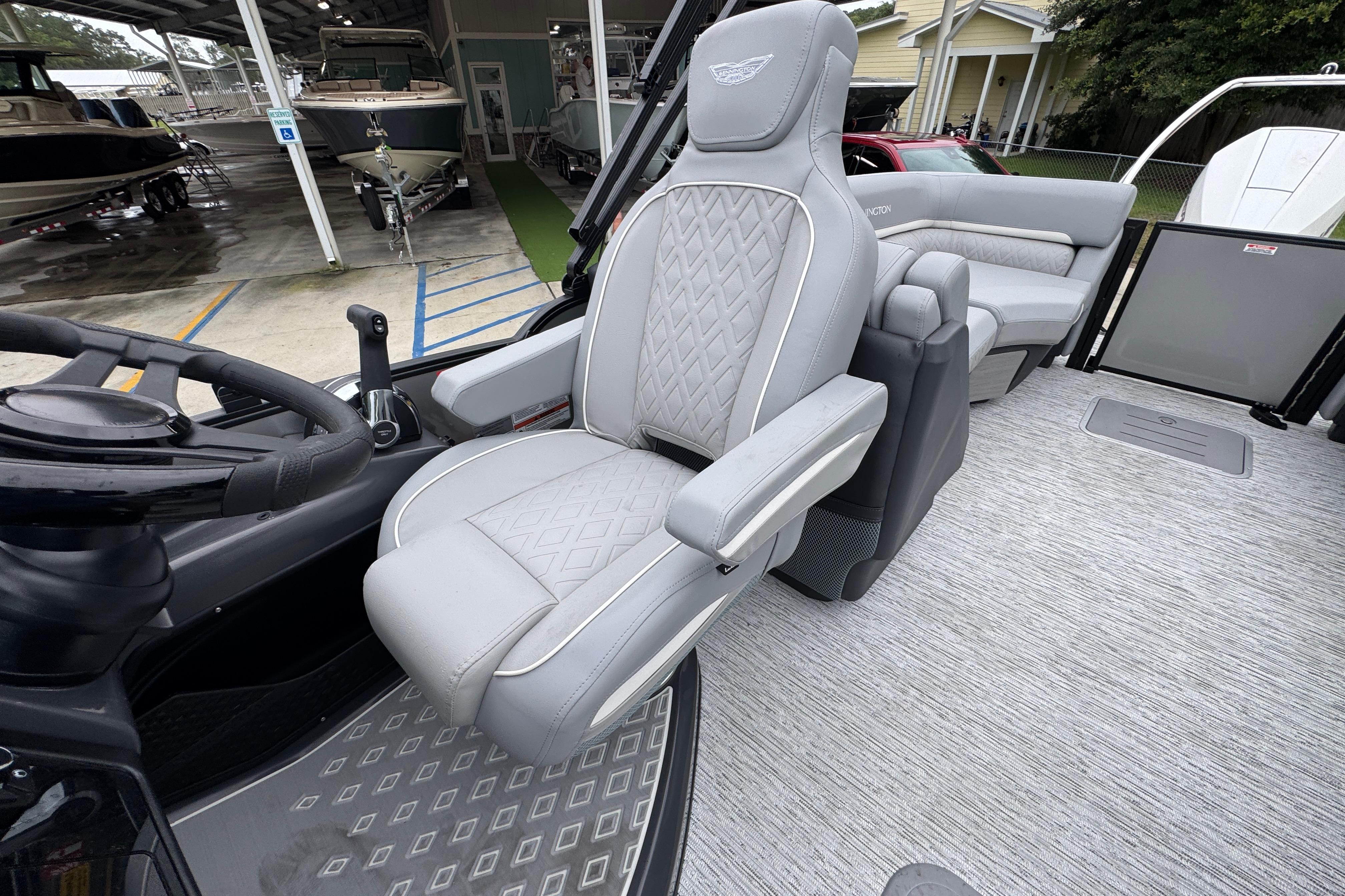 Luxurious interior of 2027 Bennington 24 MFB boat with plush seating and modern design.