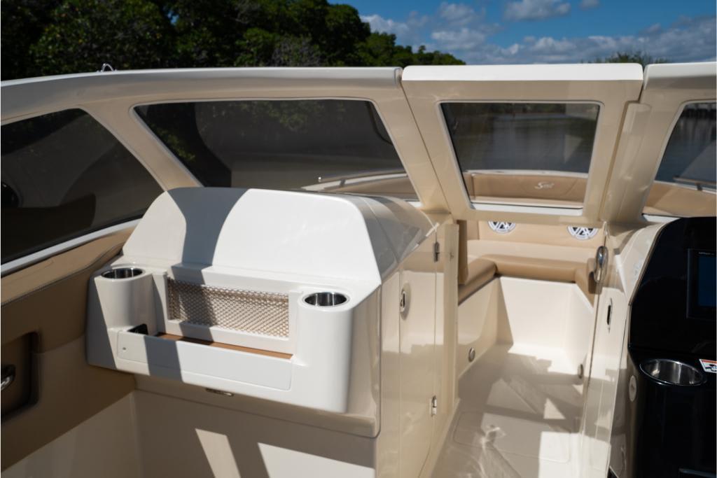 2023 Scout 240 Dorado boat interior with seating and cup holders.