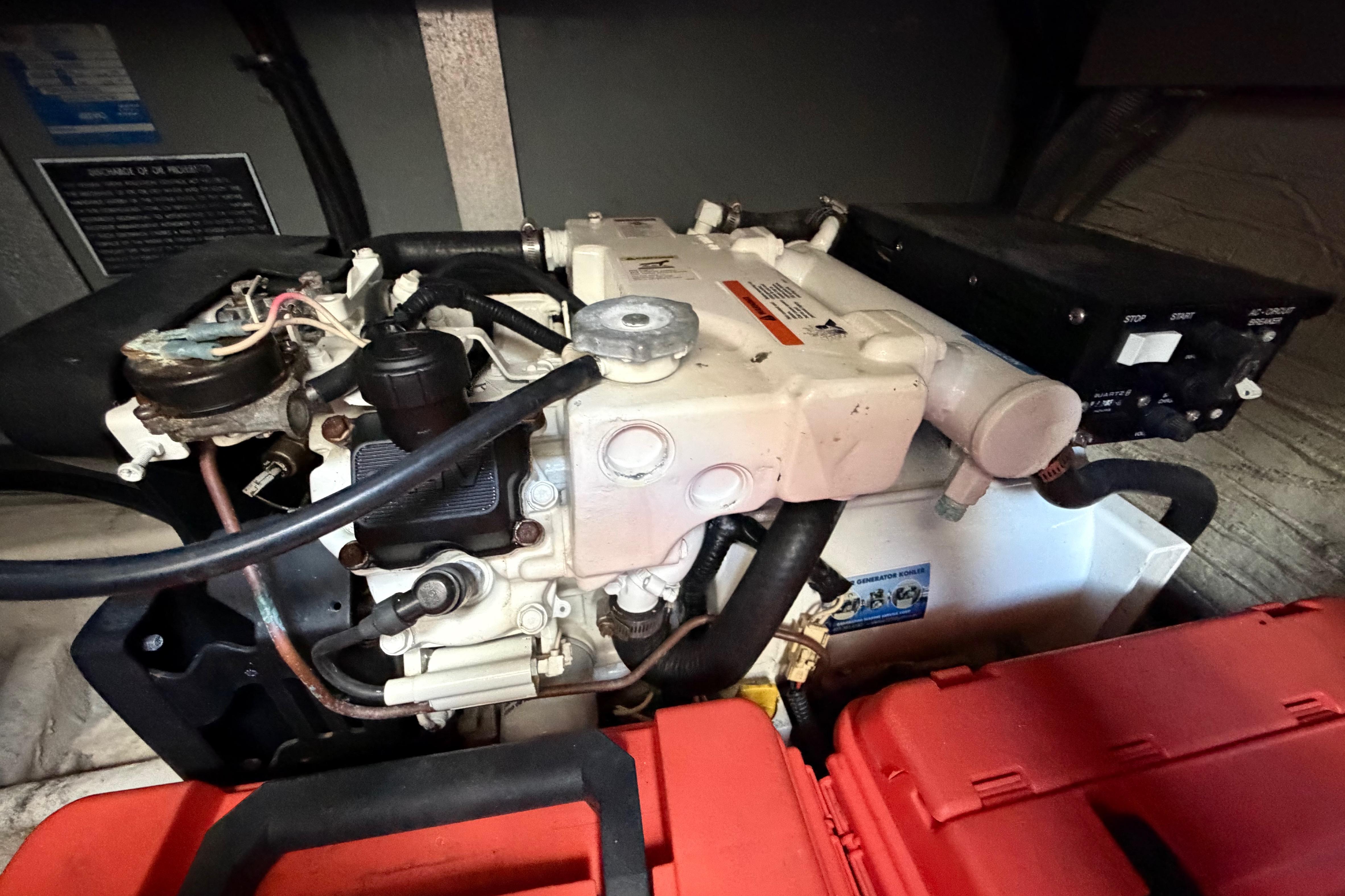 Engine compartment of a 2007 Monterey 350 Sport Yacht, showcasing mechanical components.