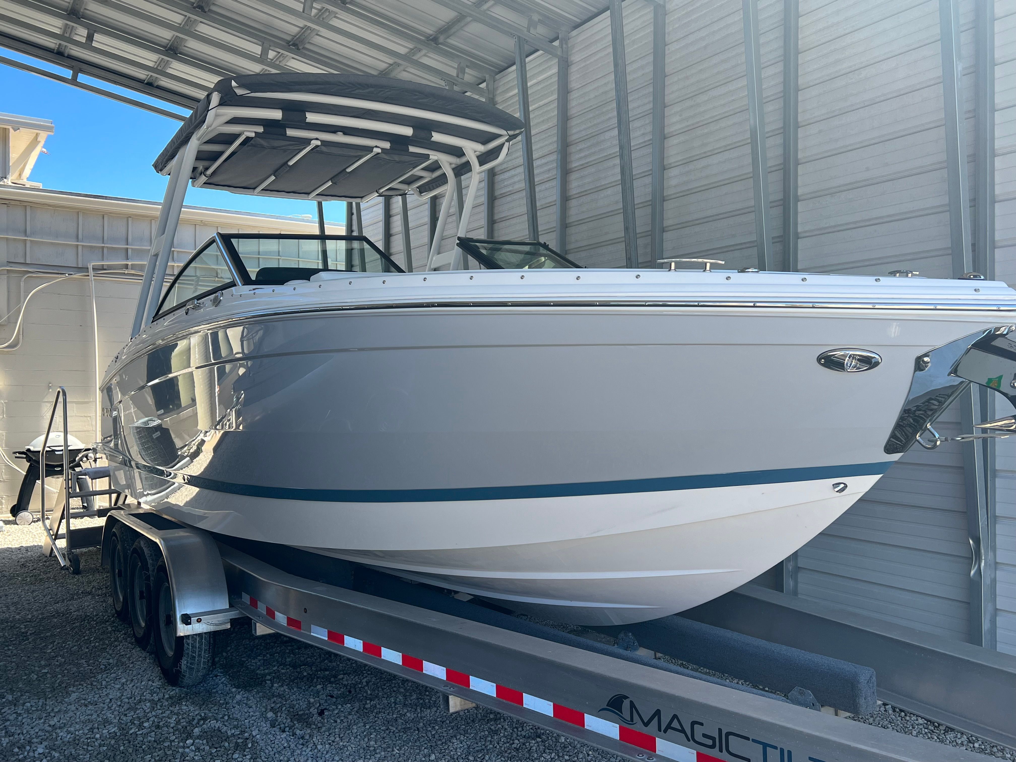 2022 Cobalt R8 Outboard boat in storage on trailer.