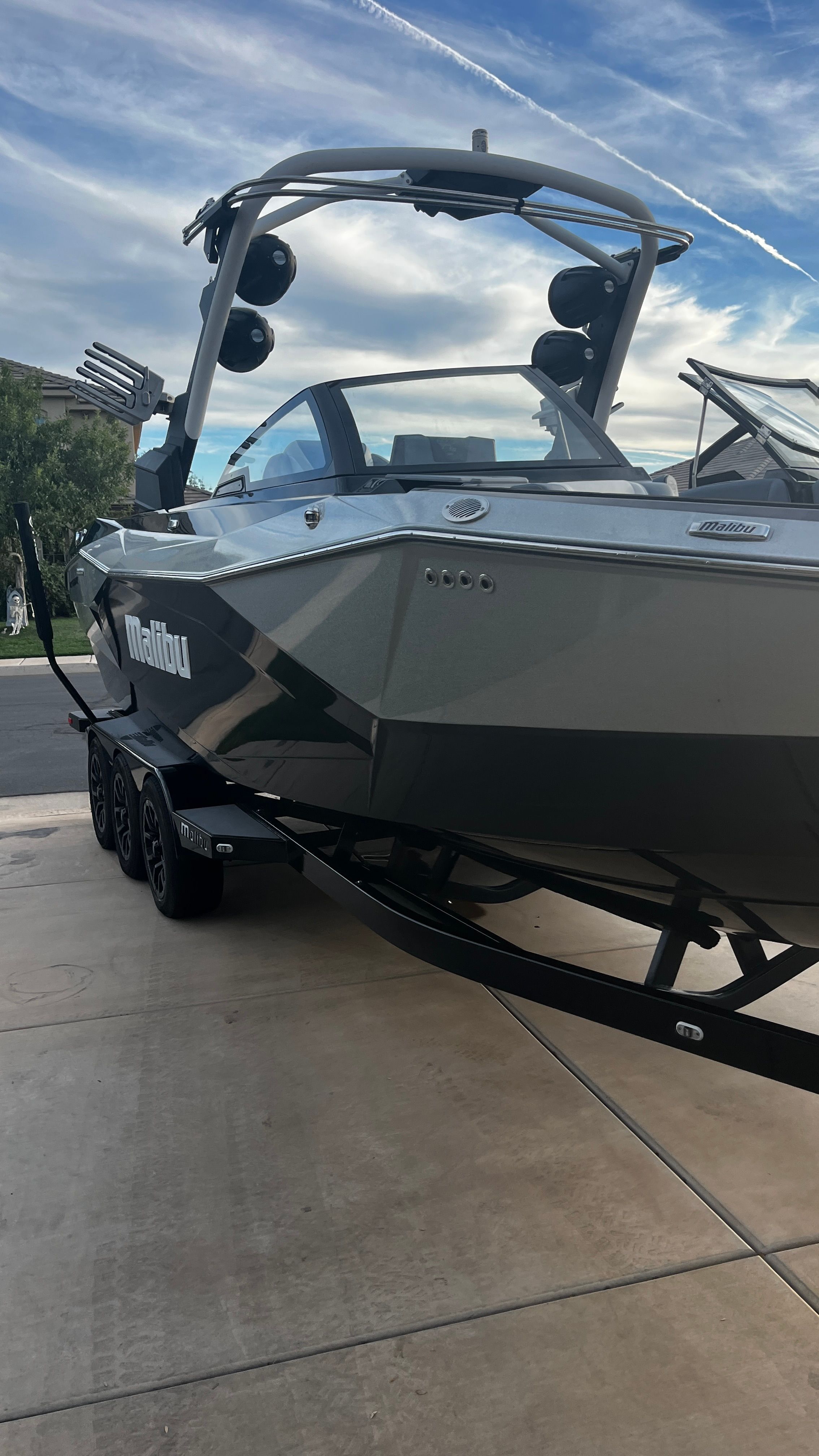 A 2023 Malibu Wakesetter 26 LSV on a trailer, ready for watersport adventures.
