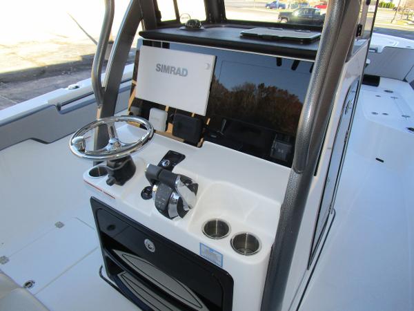 2025 Sea Pro 292 Offshore boat console with Simrad navigation system.