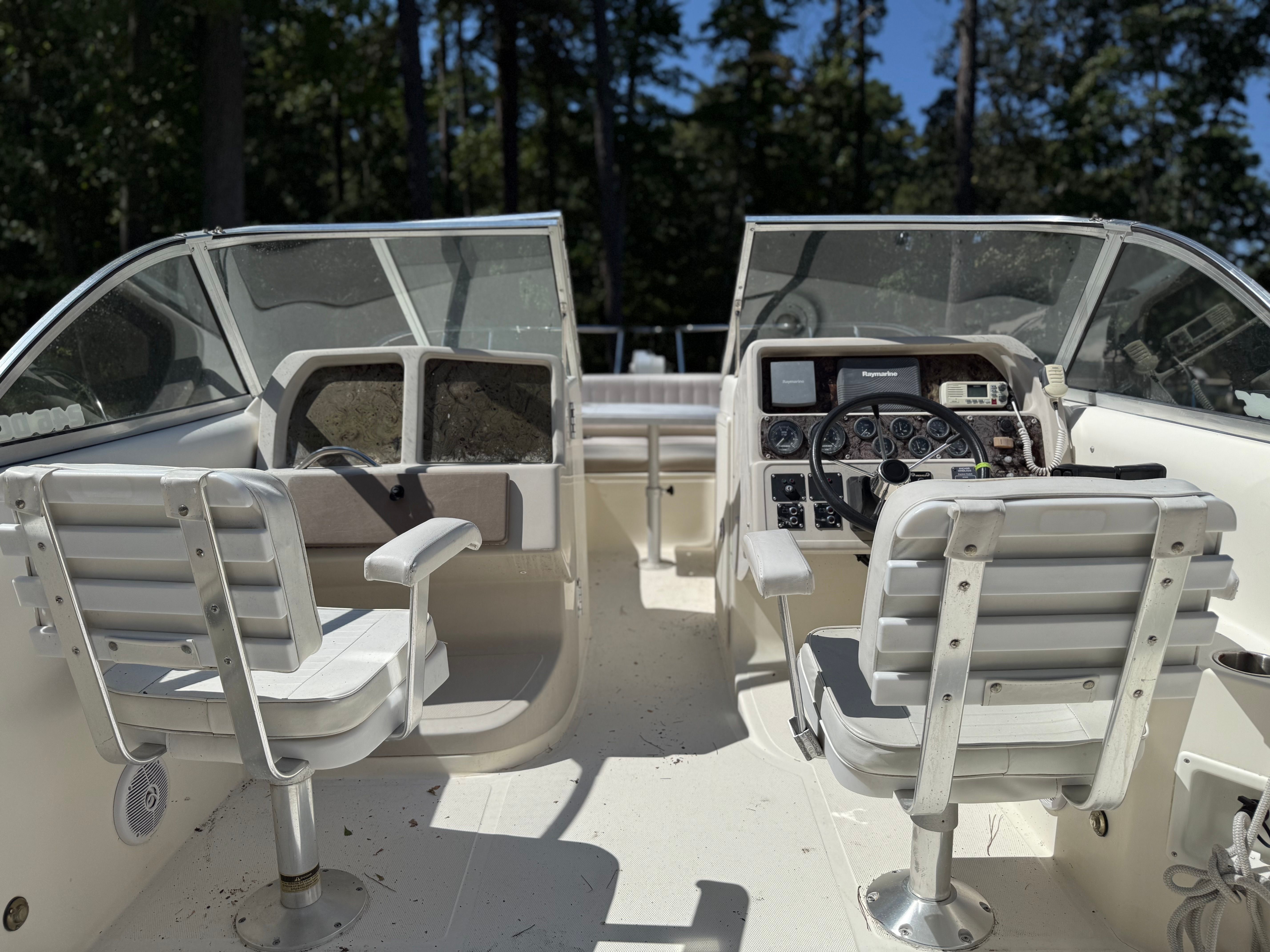 Interior view of a 2002 World Cat 246 DC boat with helm console.