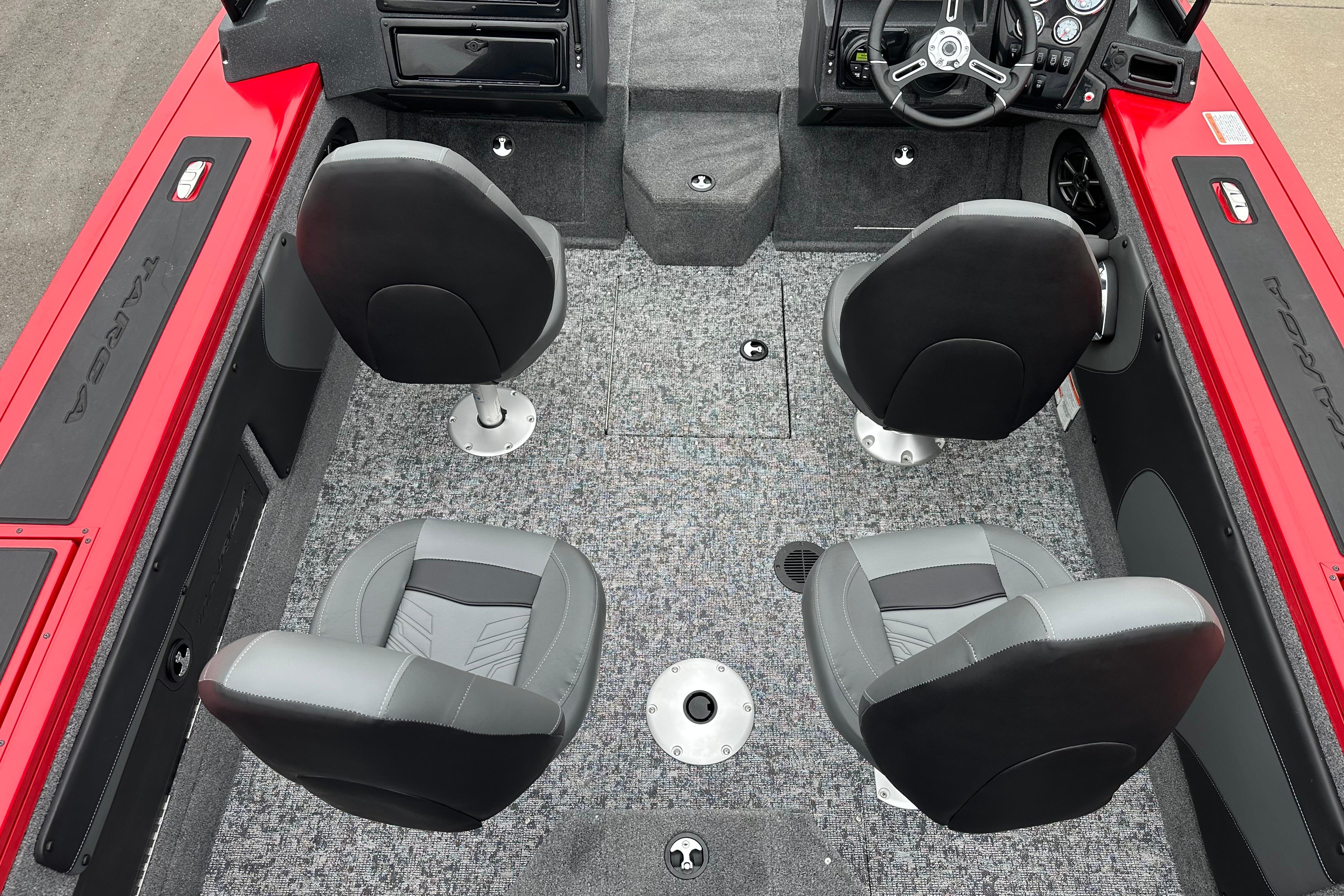 Interior of 2026 Tracker Targa V-19 Combo boat with four seats and steering console.