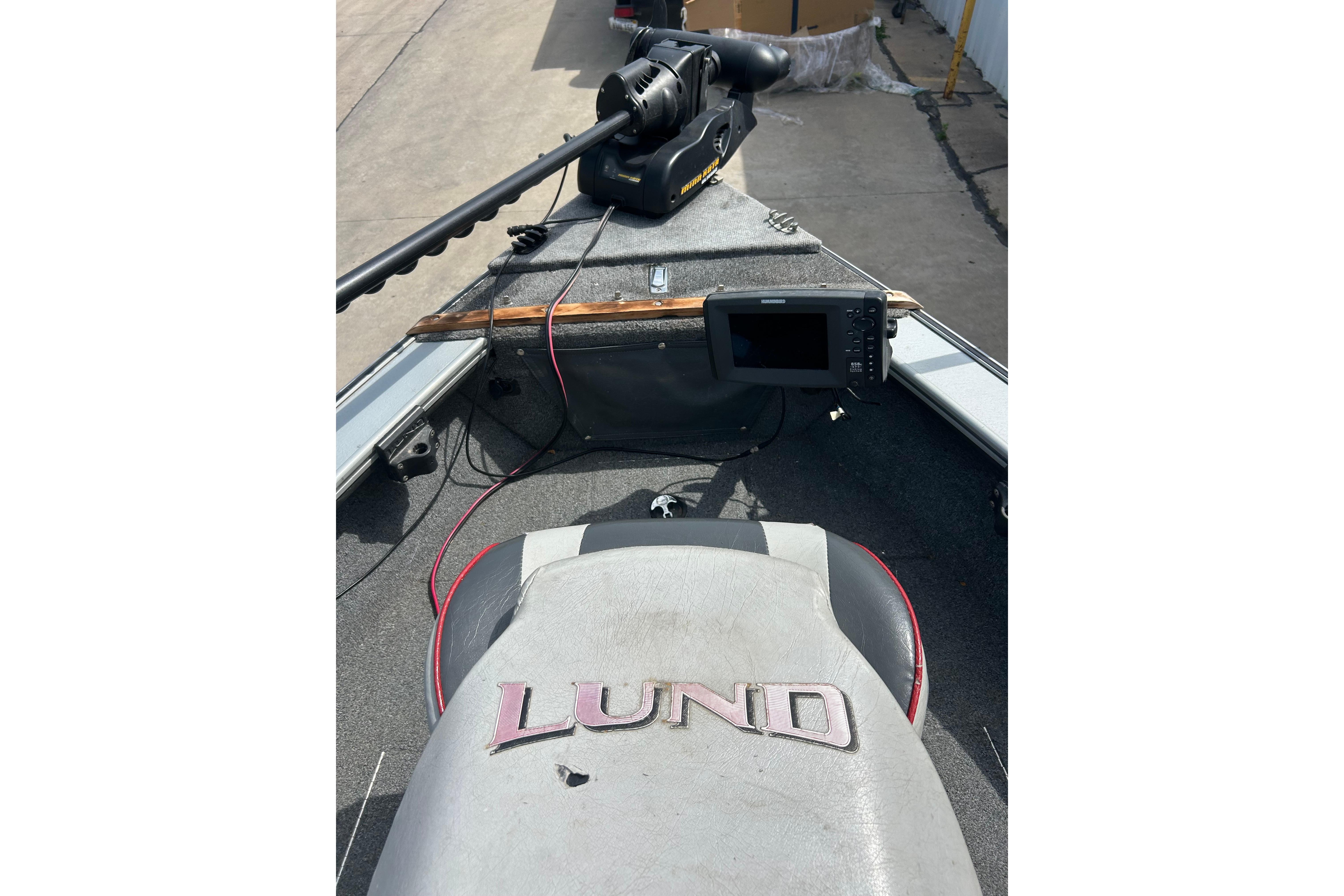 2008 Lund 1850 Fisherman boat interior with trolling motor and fish finder.