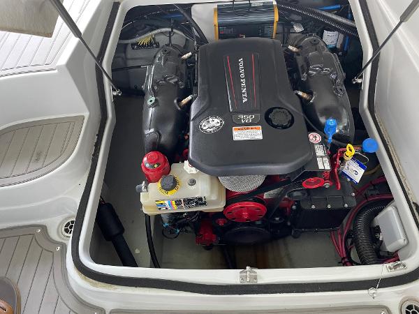 Engine compartment of a 2019 Crownline E255 boat featuring a Volvo Penta engine.