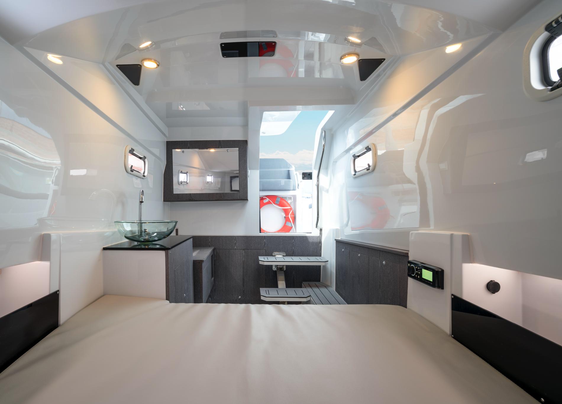 Luxurious interior of 2024 Pirelli 35 boat featuring modern design and sleek furnishings.