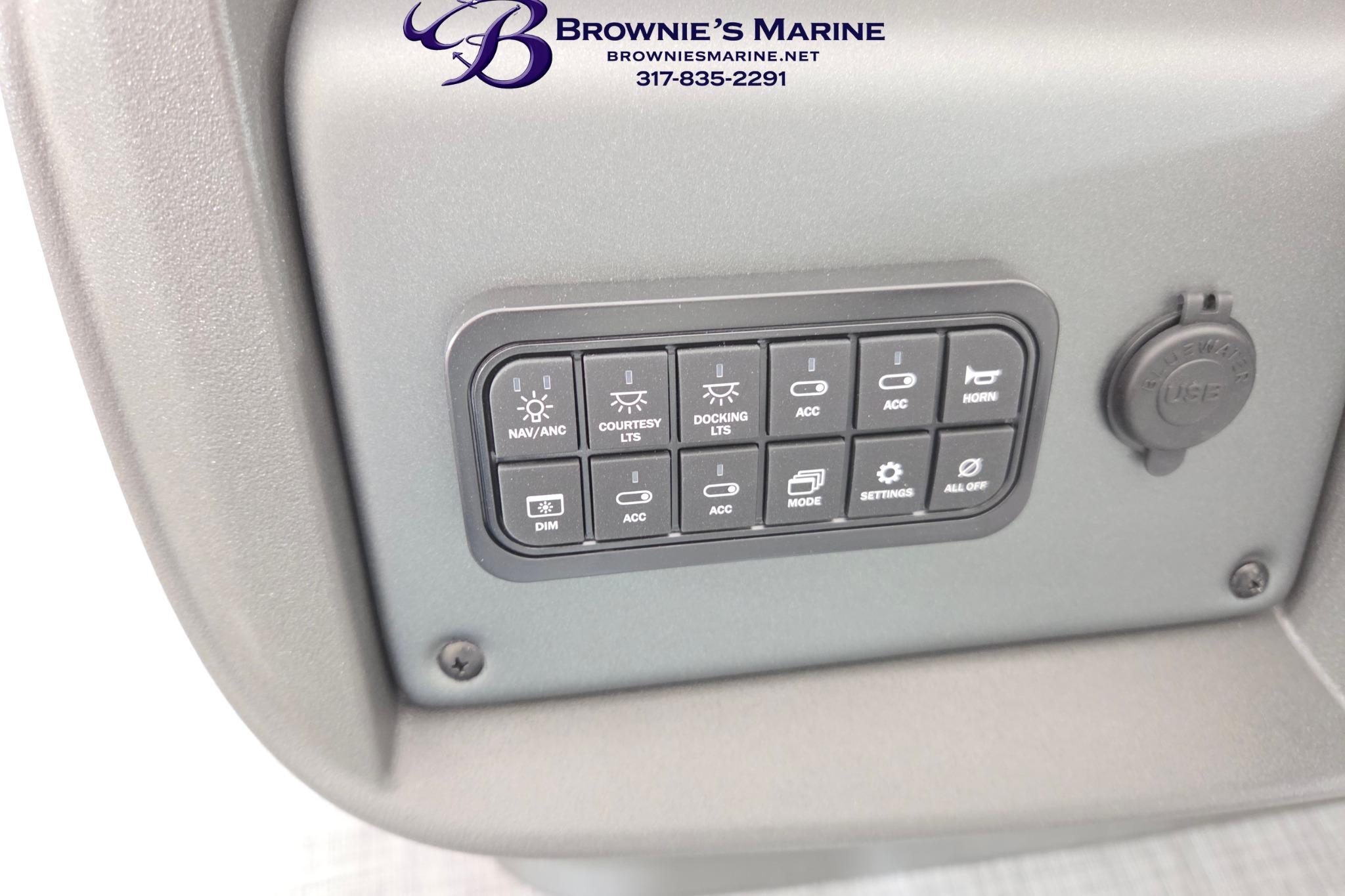 Control panel of 2026 Sun Tracker Party Barge 18 DLX with various switches and settings.