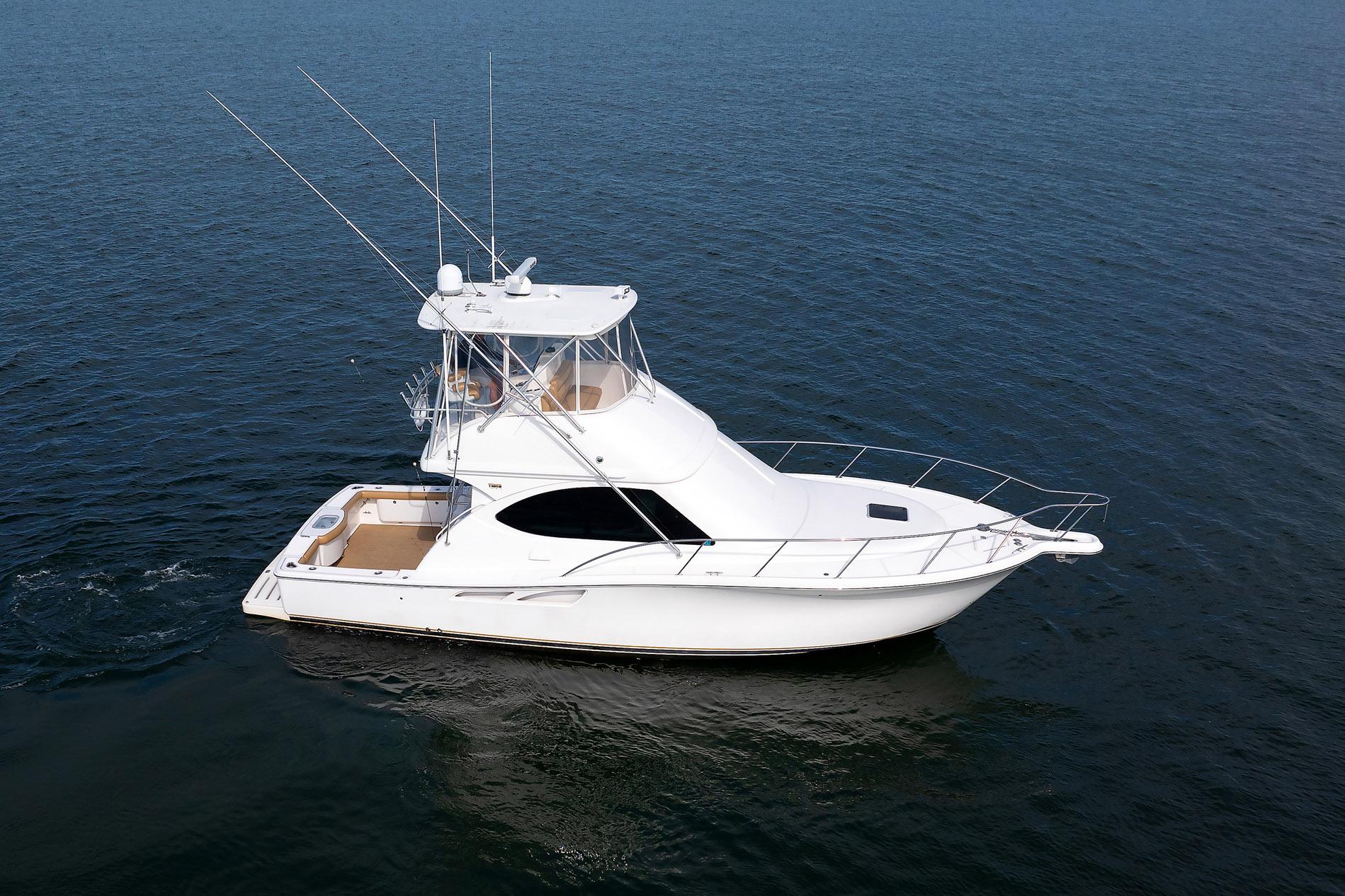 2007 Tiara Yachts 3900 Convertible cruising on open water.
