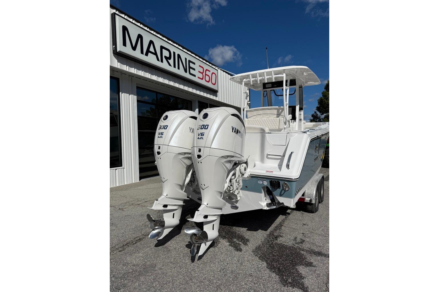 2026 Sea Hunt Ultra 285 Coffin Box boat with twin Yamaha engines at Marine 360 dealership.