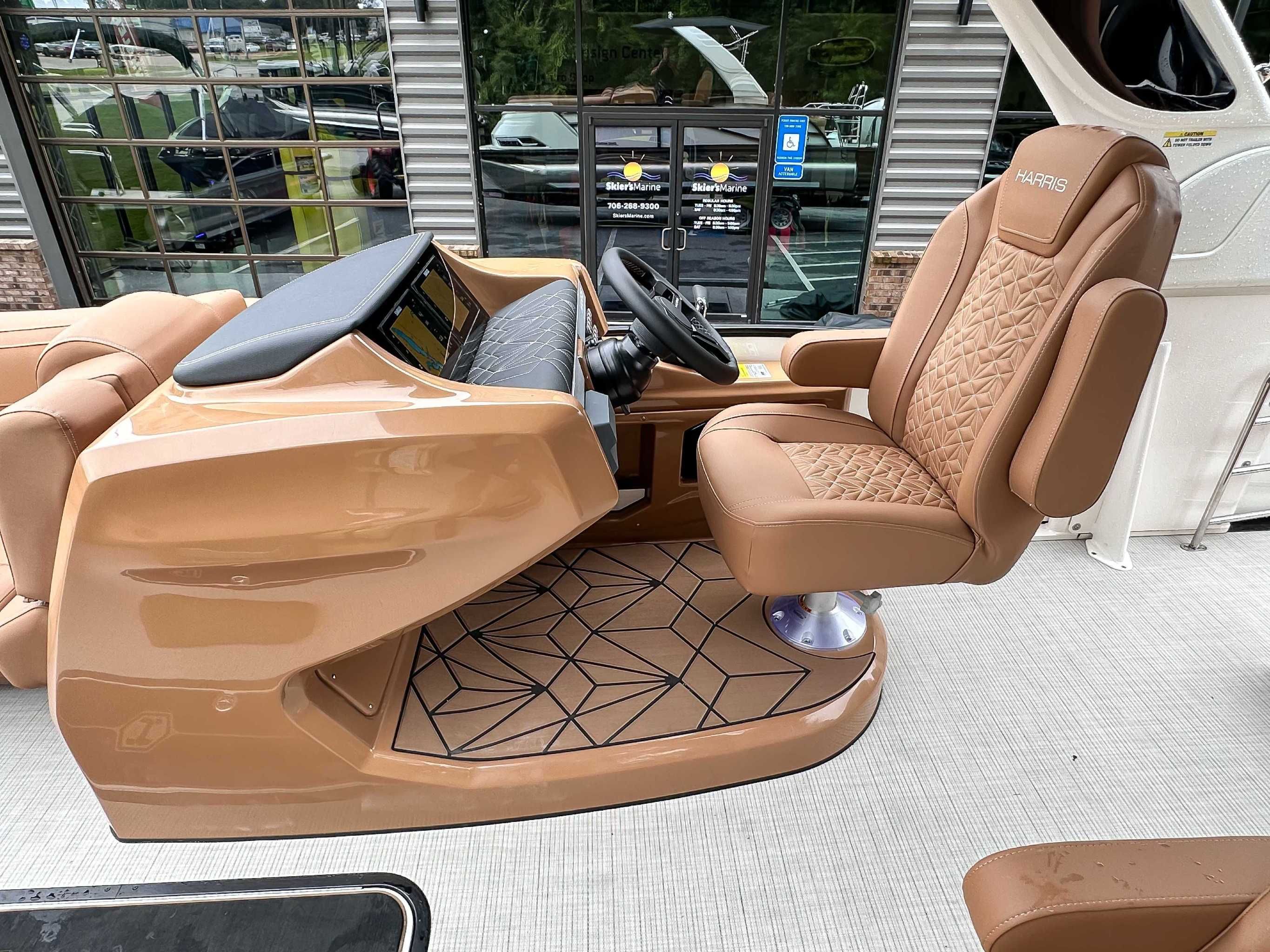 Luxurious helm of the 2025 Harris Grand Mariner 230 SLDH.