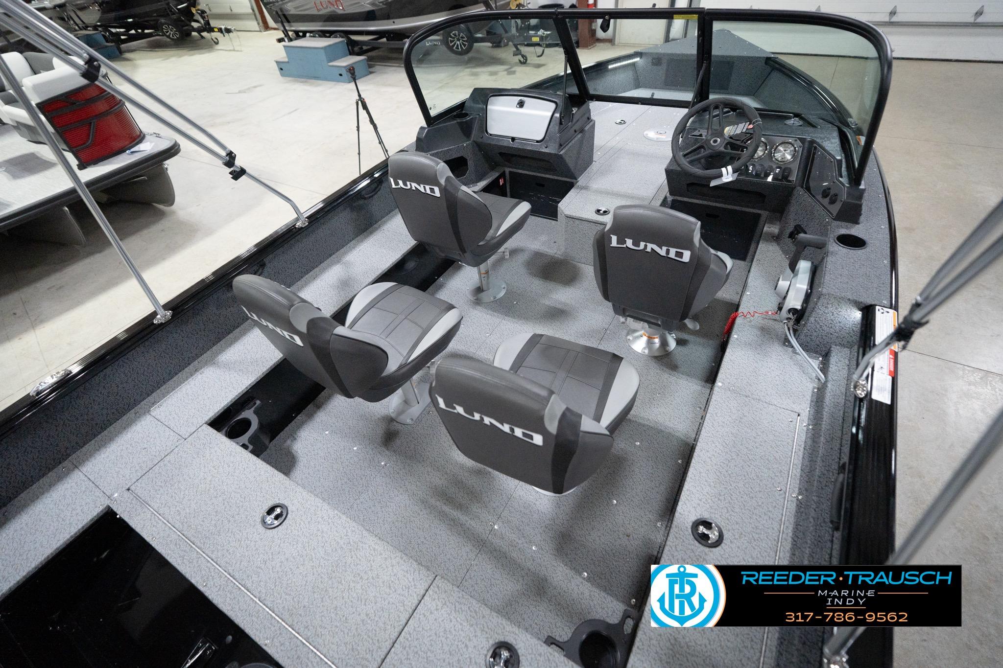 2026 Lund 1800 Explorer Sport boat interior with four seats and steering console.