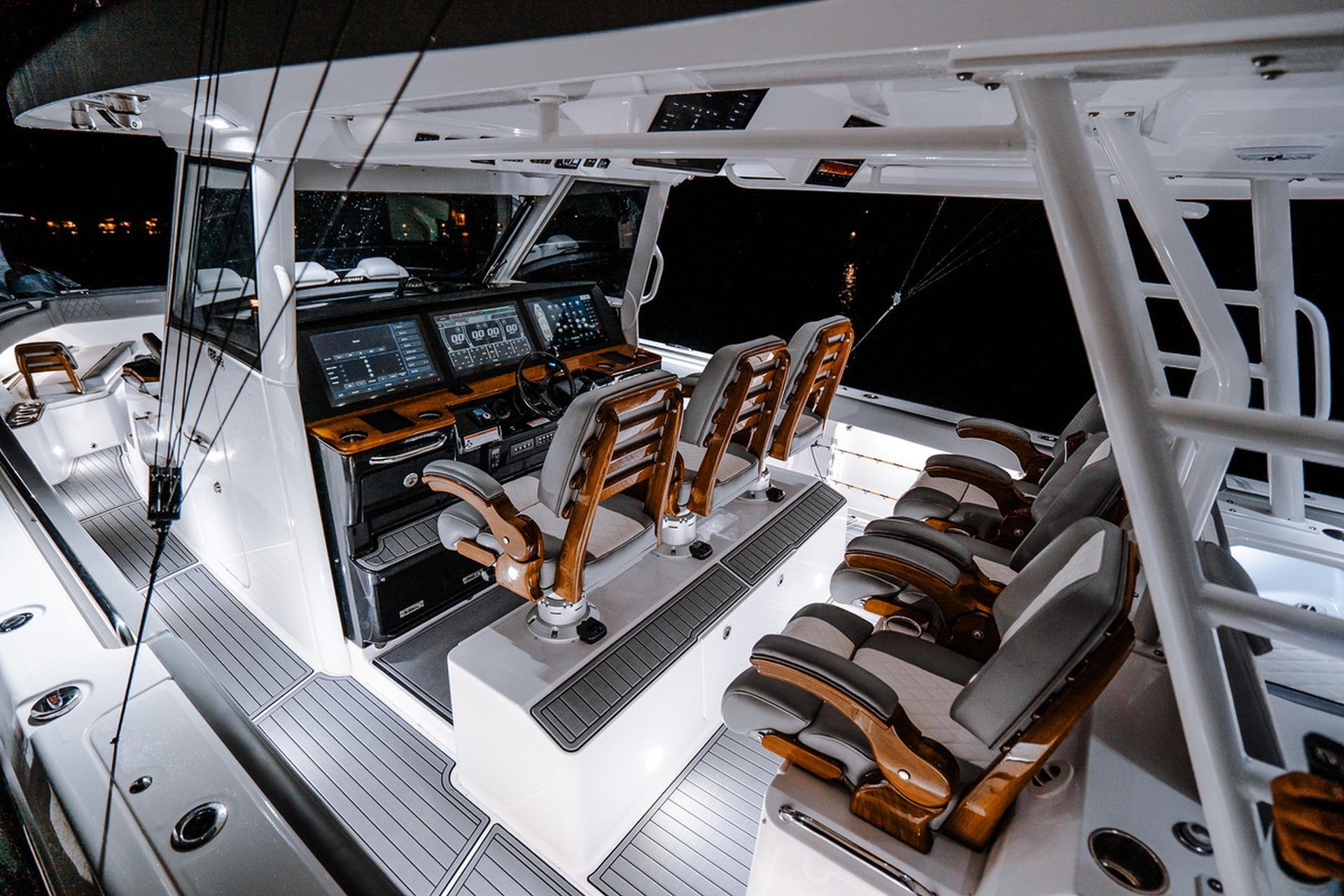 Luxurious interior of 2026 Everglades 455 Center Console boat with advanced navigation systems.