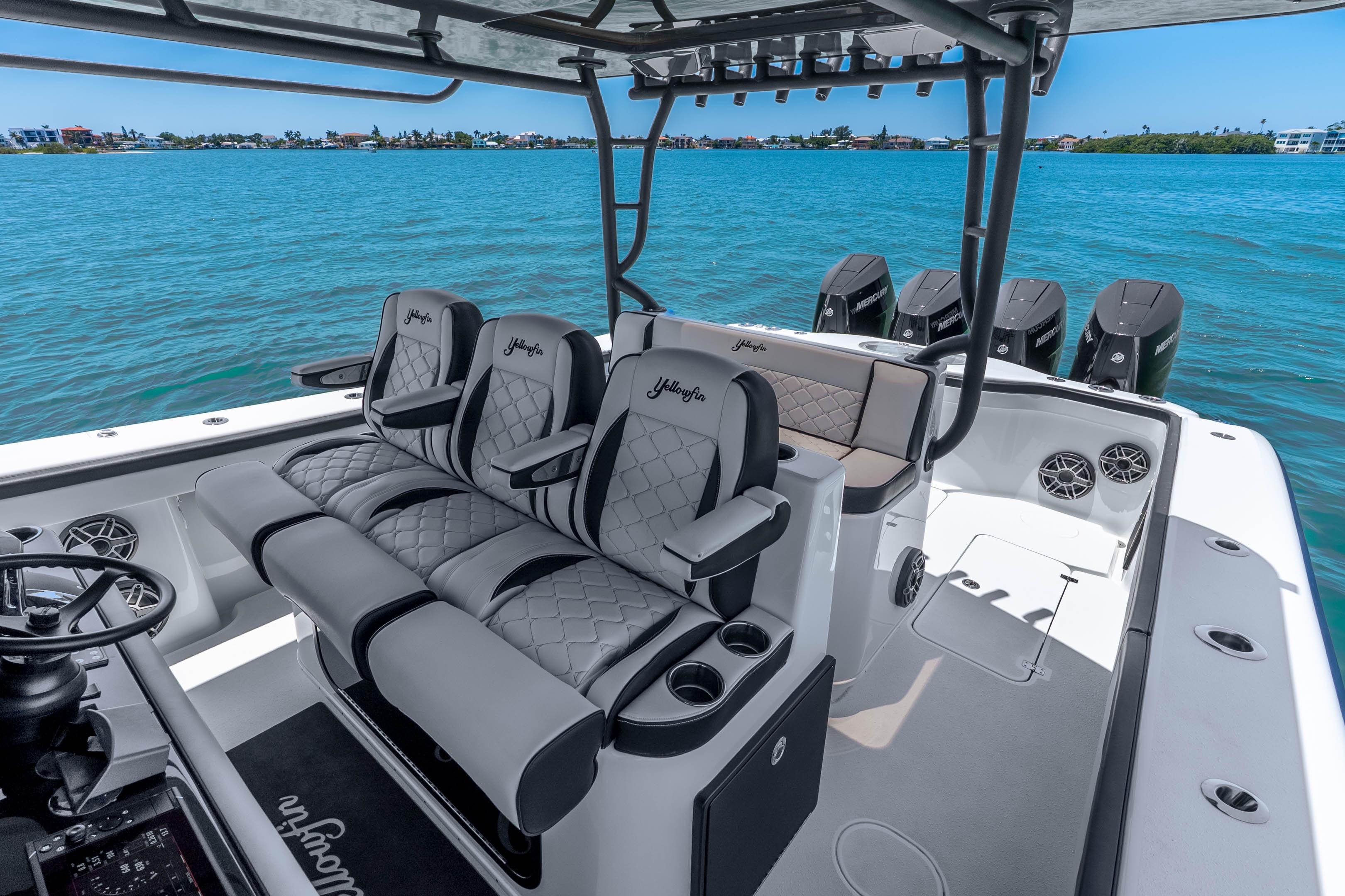 2024 Yellowfin 42 Offshore boat interior with luxurious seating and multiple outboard engines.