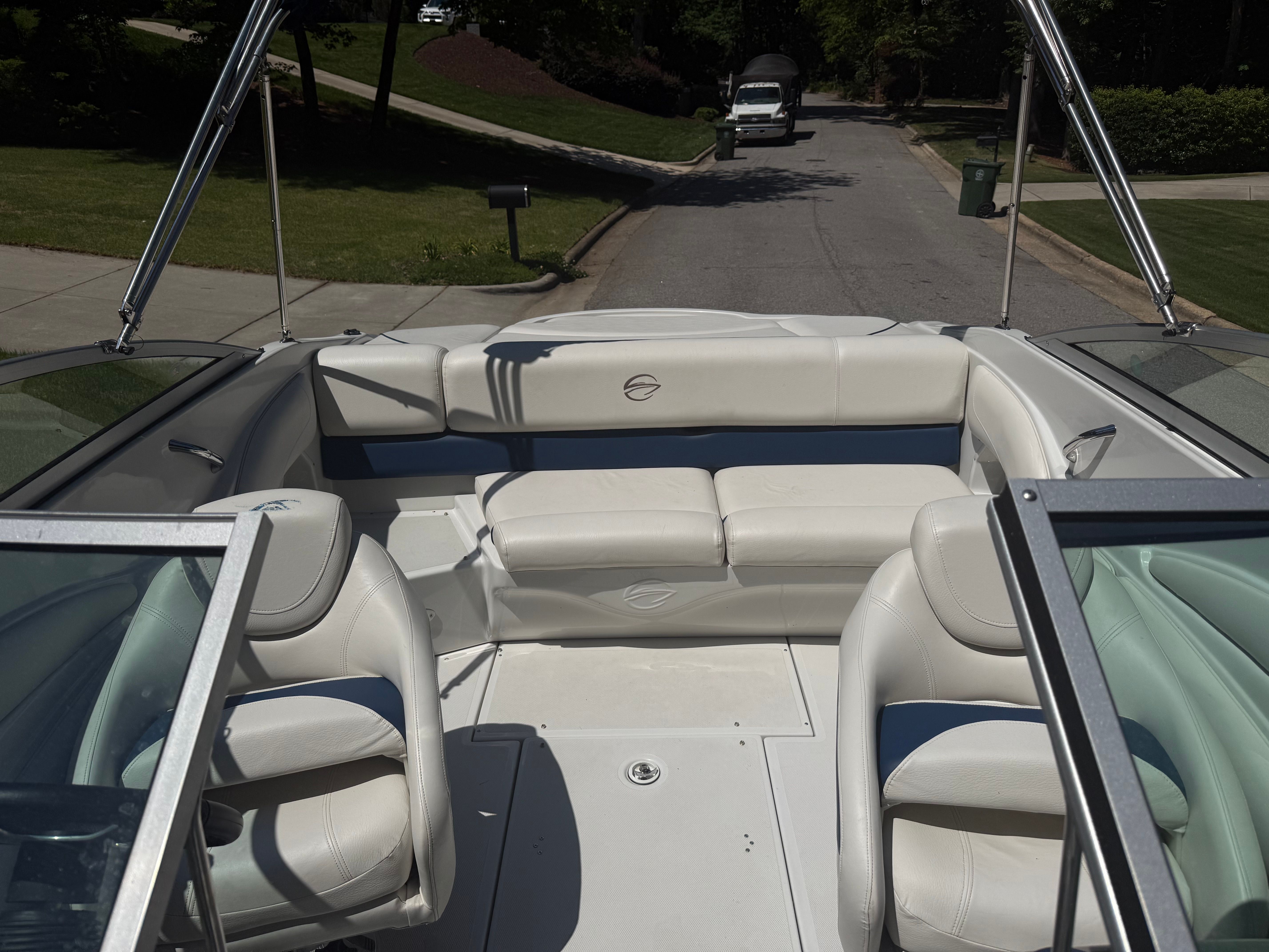Interior of a 2008 Crownline 210 LX boat with white seating.