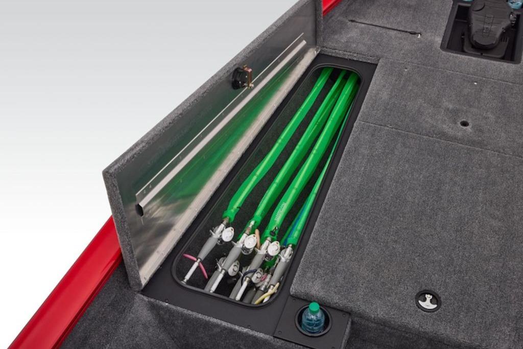 2026 Tracker Pro Team 190 boat with open storage compartment and fishing rods.