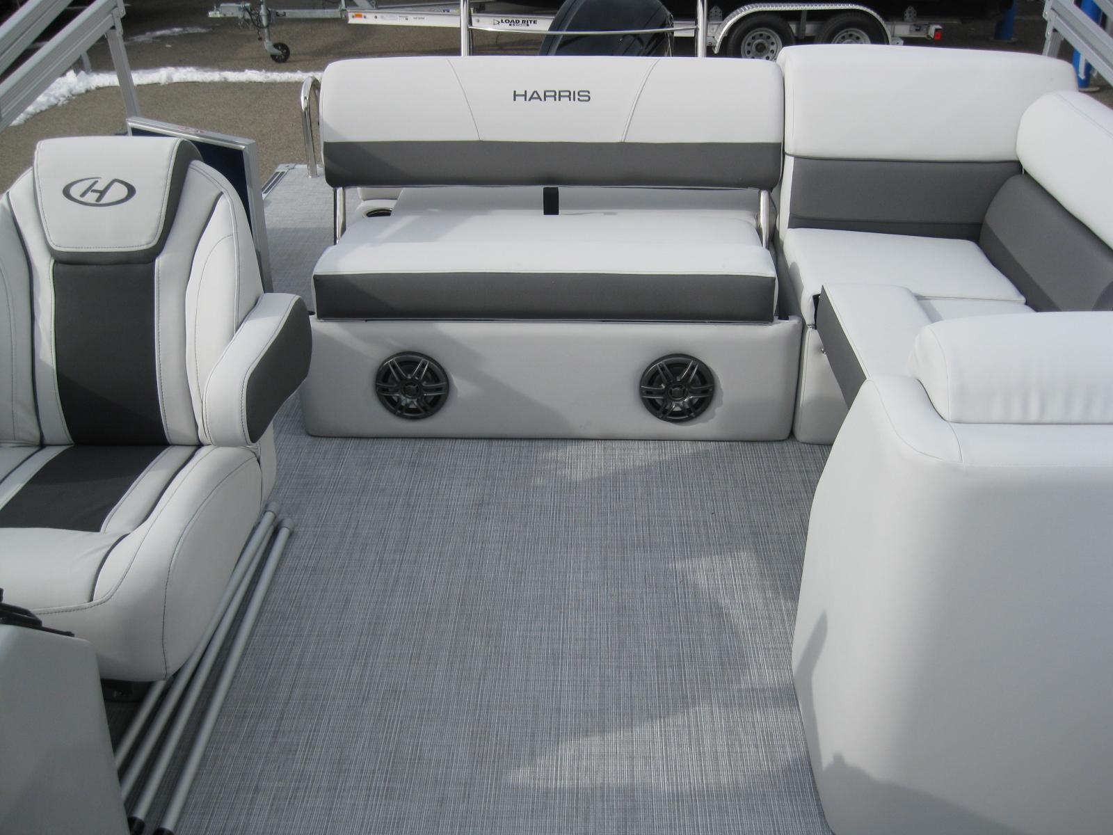 2023 Harris FloteBote Cruiser 230 interior with white and gray seating.