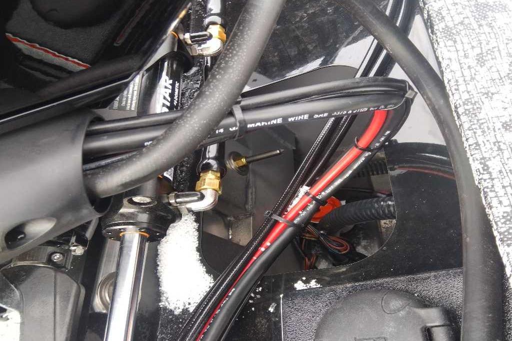 Close-up of 2026 Tracker Targa V-18 Combo boat wiring and components.