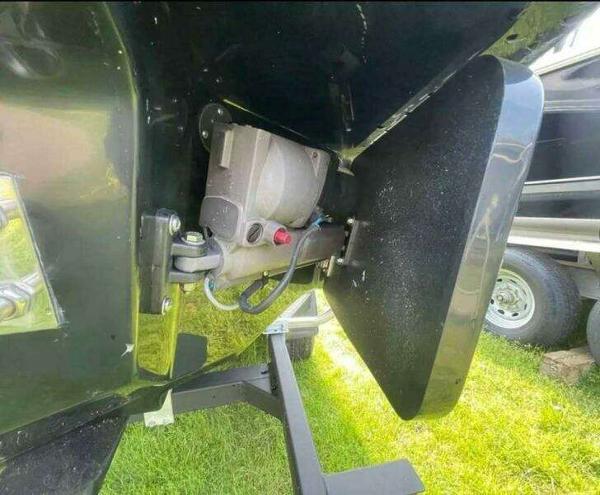 2022 Chaparral 23 Surf boat component, close-up view on a trailer.