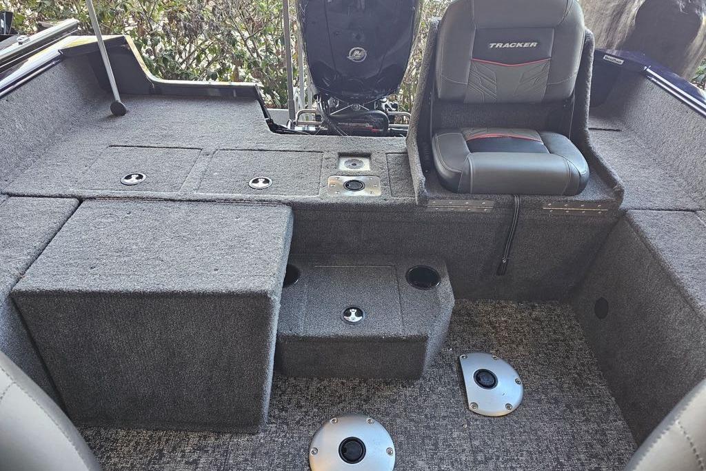 Interior of 2026 Tracker Bass Tracker Classic CC boat with seating and storage compartments.