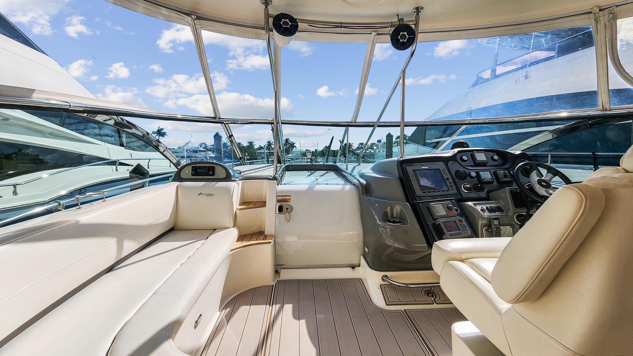 2007 Cruisers Yachts 520 Express cockpit with luxurious seating and modern controls.