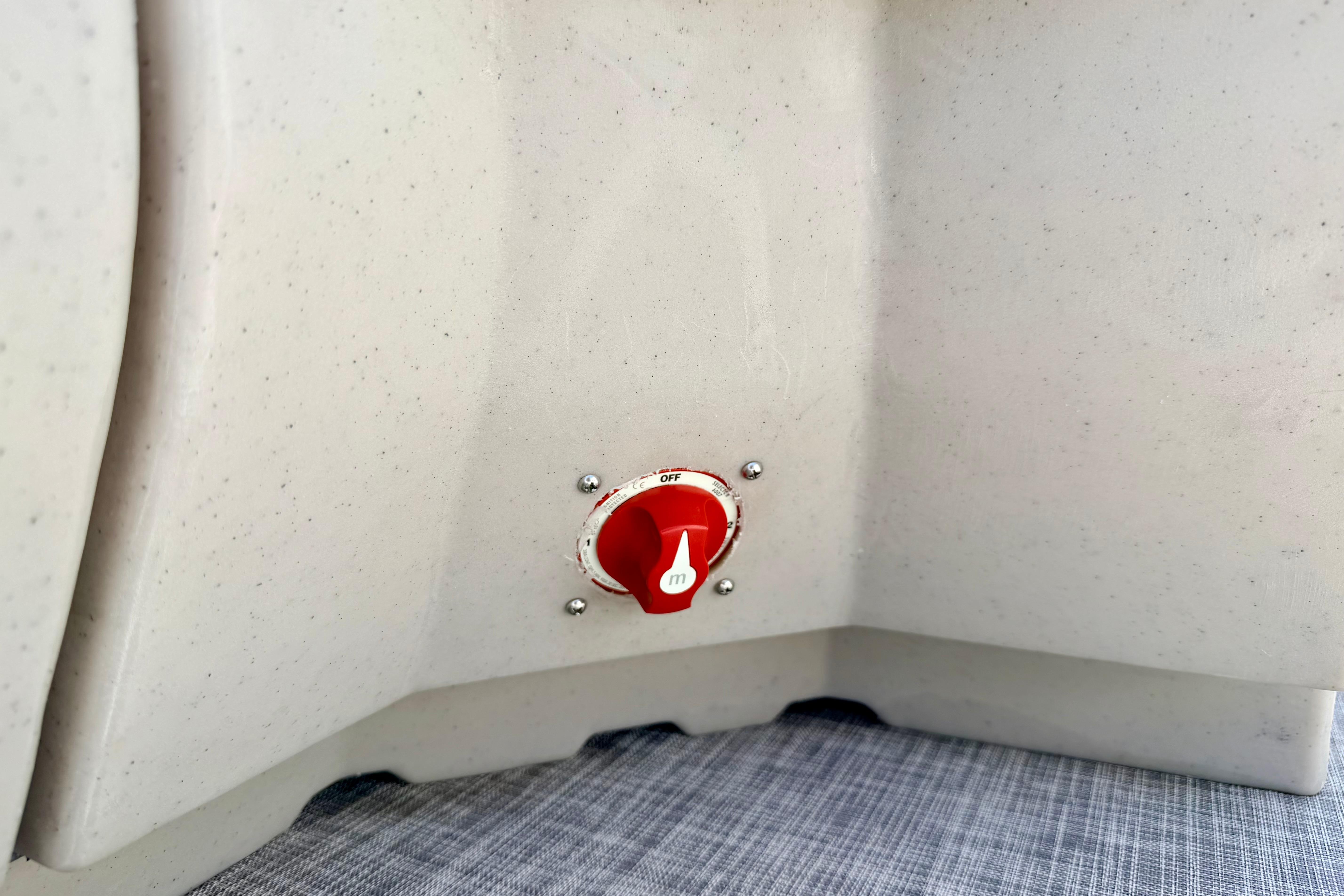 Red switch on 2019 Crestliner 240 Rally DX CW boat interior.