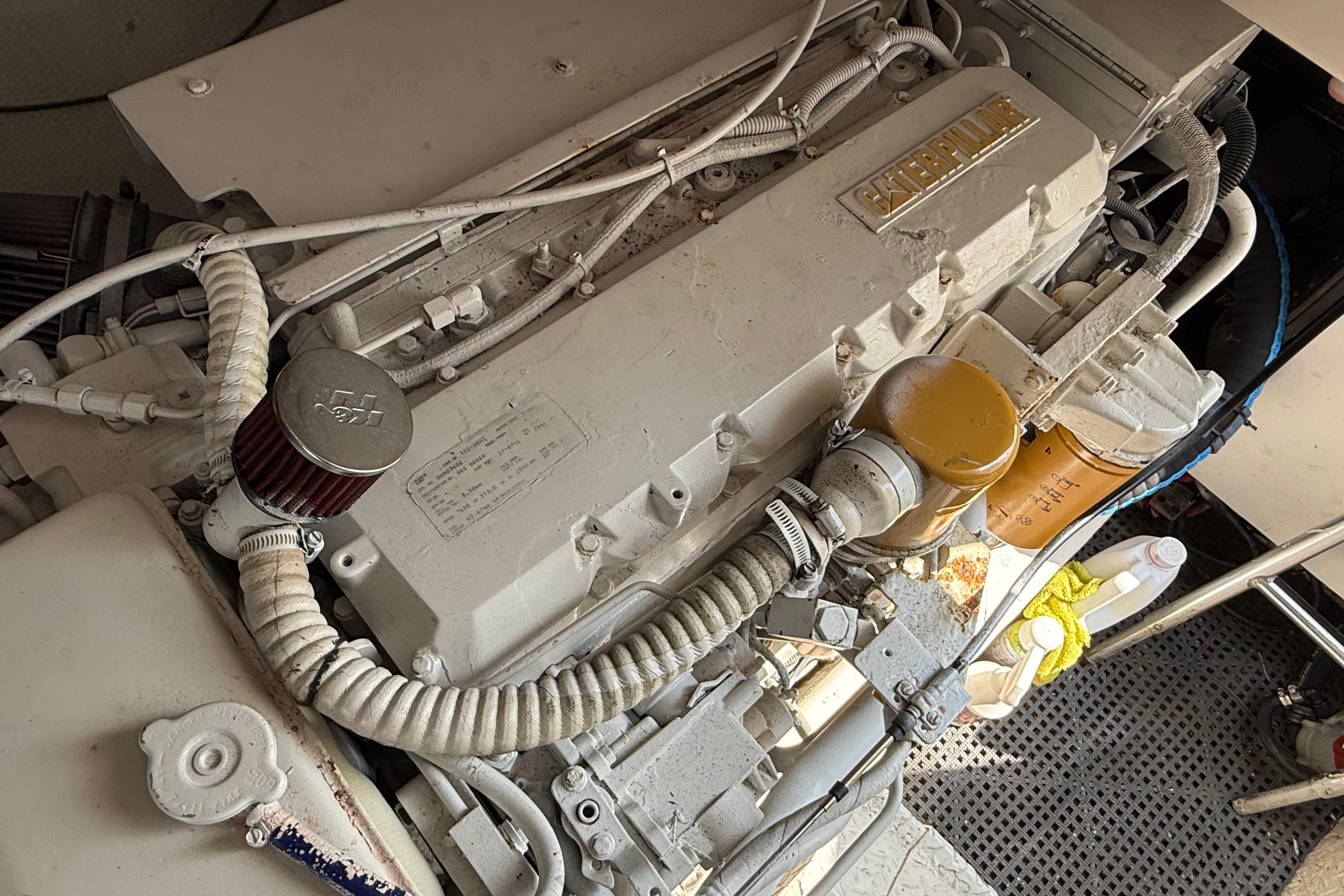 Engine compartment of a 1999 Ocean Yachts 40 Express with Caterpillar engine.