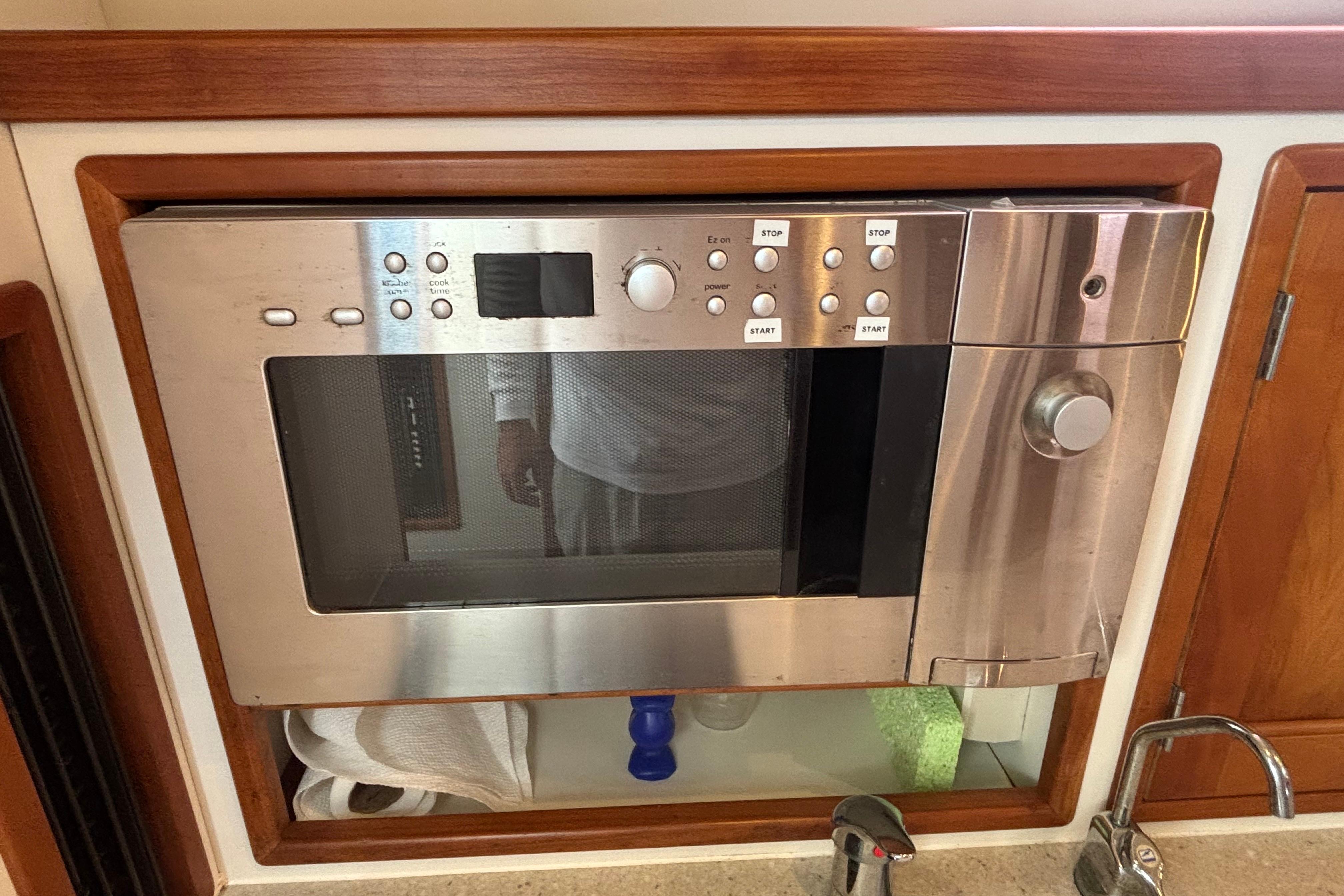 Built-in microwave in 2006 MJM 34z Downeast yacht kitchen area.