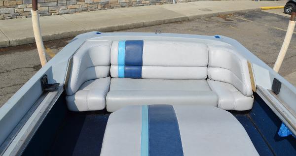 1989 Correct Craft Ski Nautique boat interior with gray and blue seating.