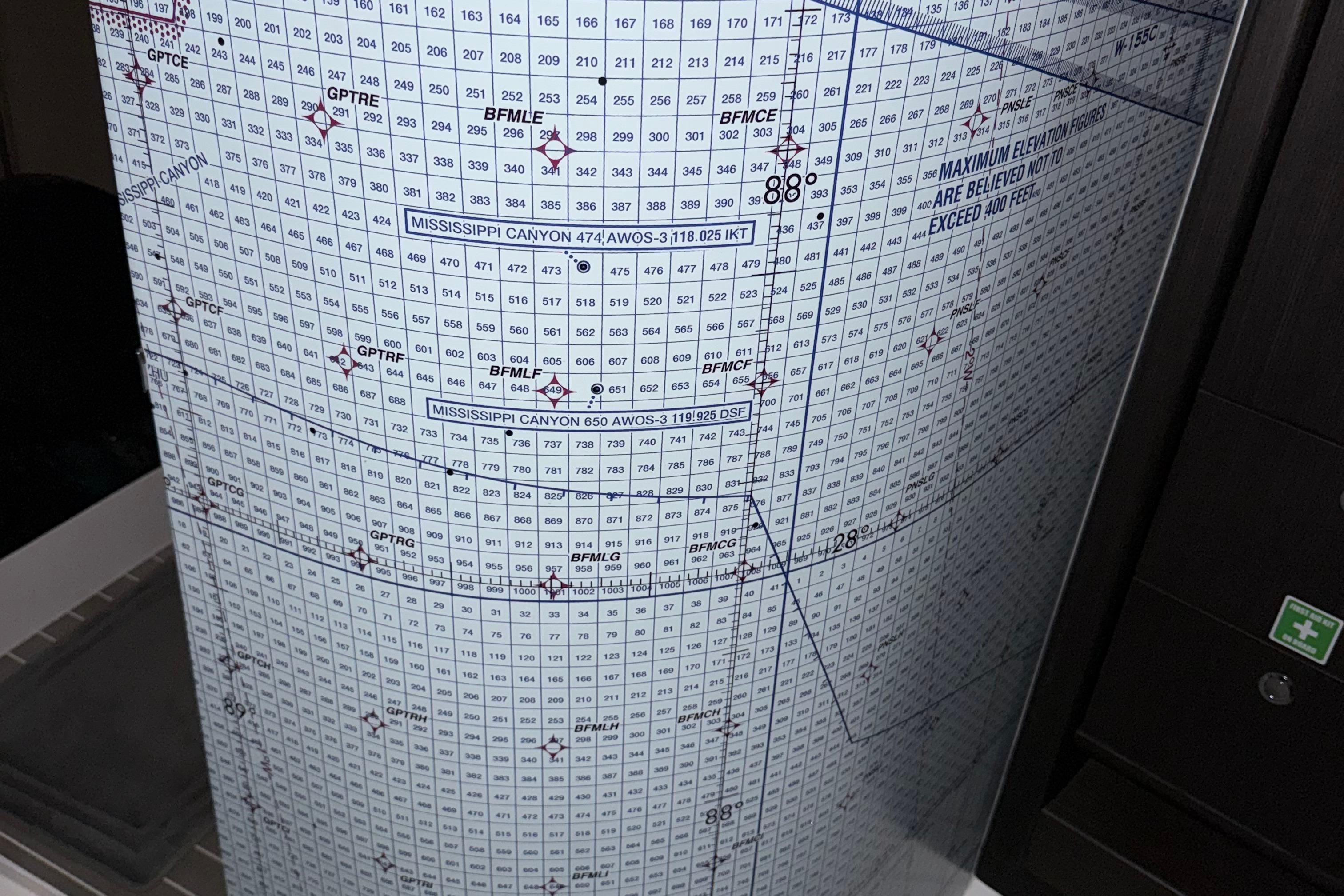 The nautical chart wrap has been professionally removed. Looks brand new again!