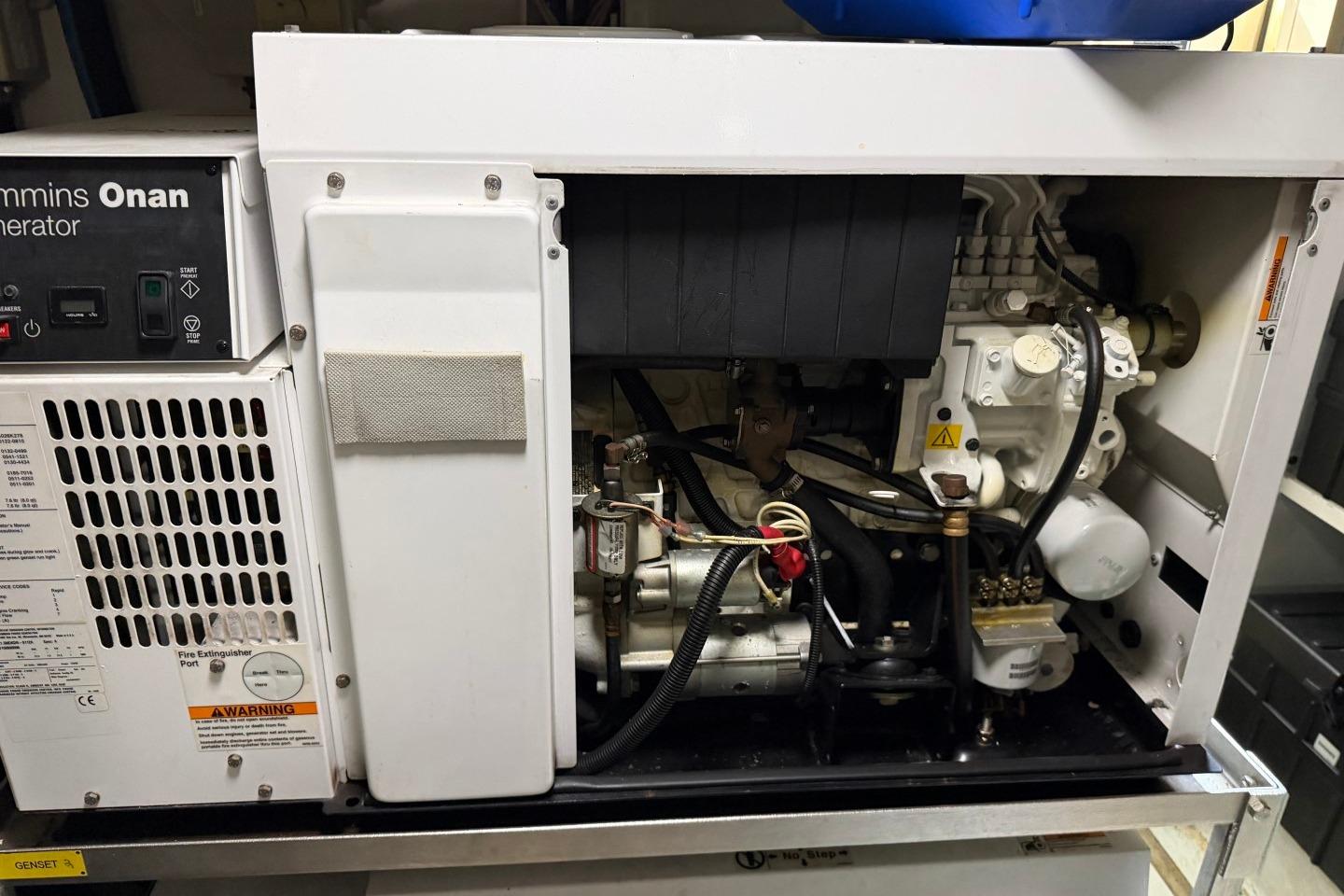 Cummins Onan generator inside a 2017 Azimut Fly 72 yacht, showcasing engine components.