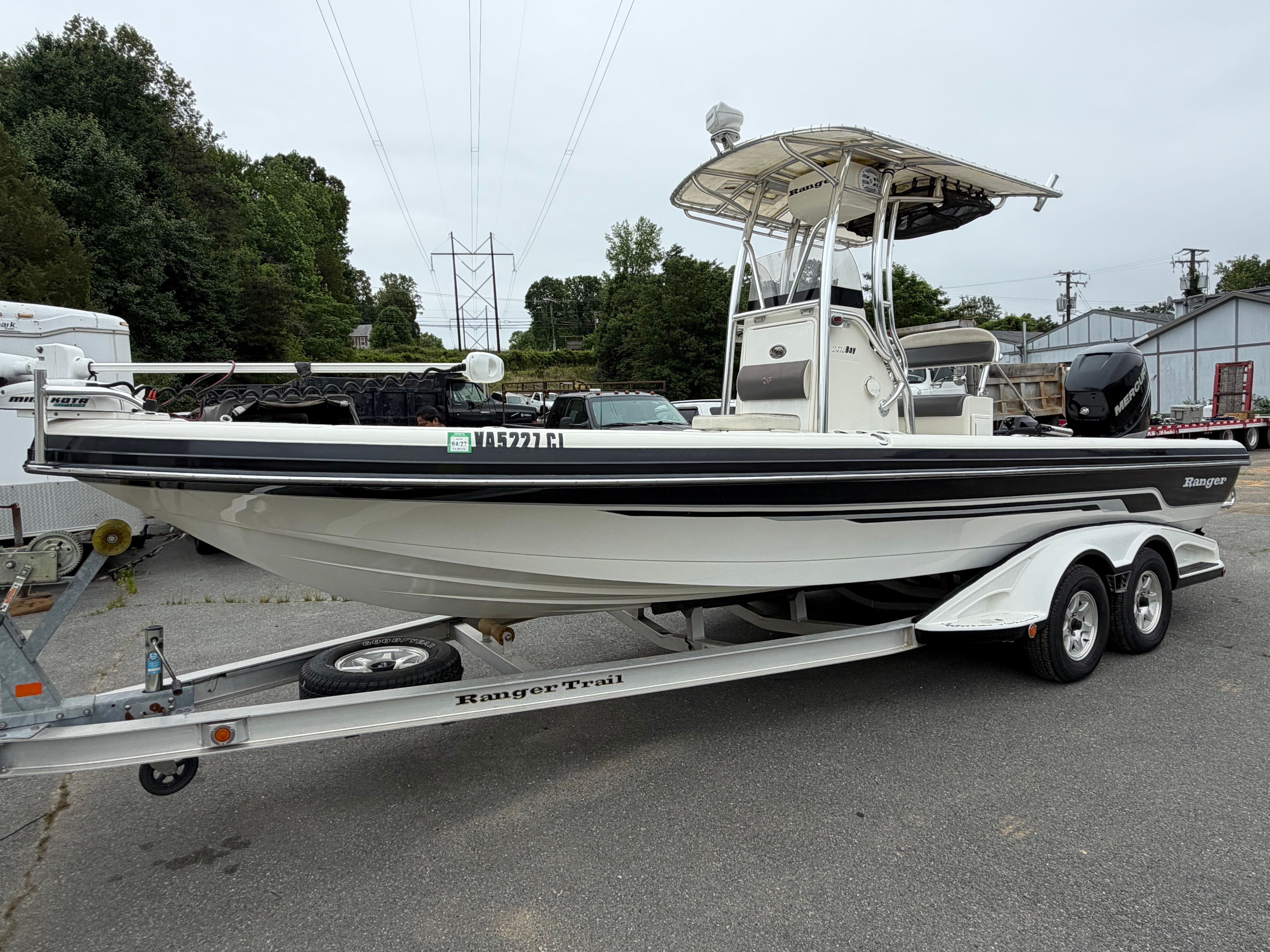 2008 Ranger 2400 Bay Ranger boat on trailer, side view.